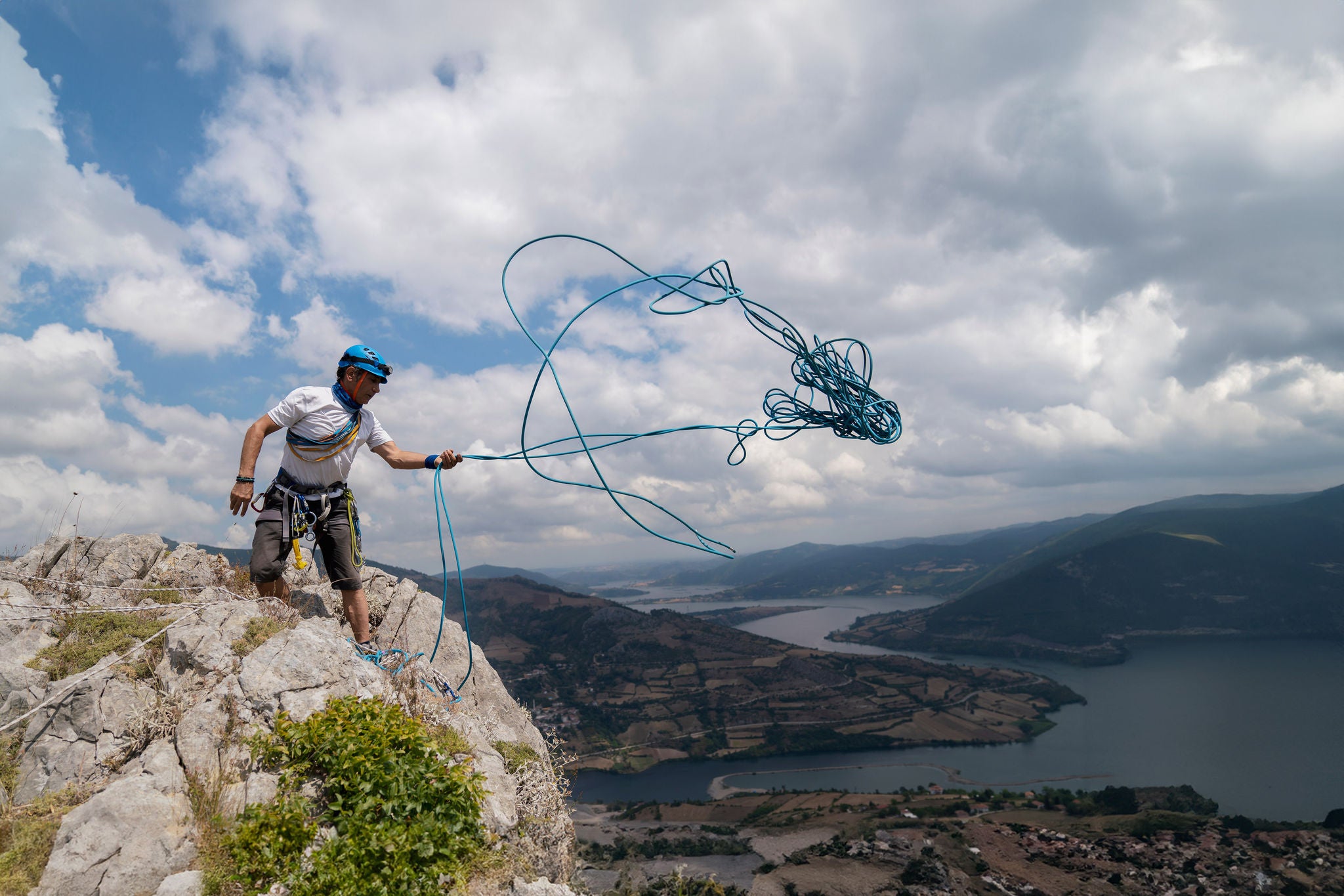 Close up of rock climber tying knot