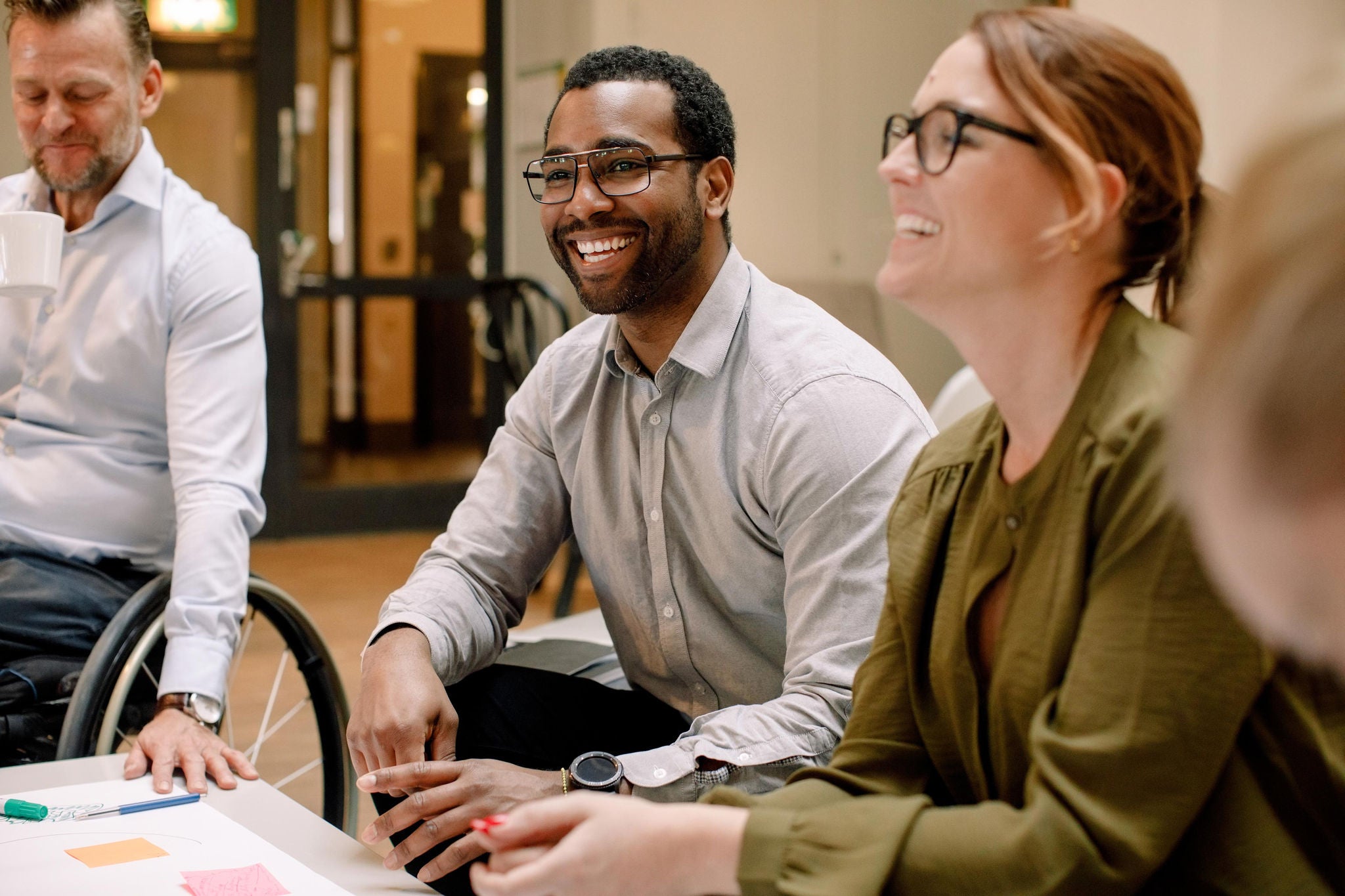 Smiling business people working in office