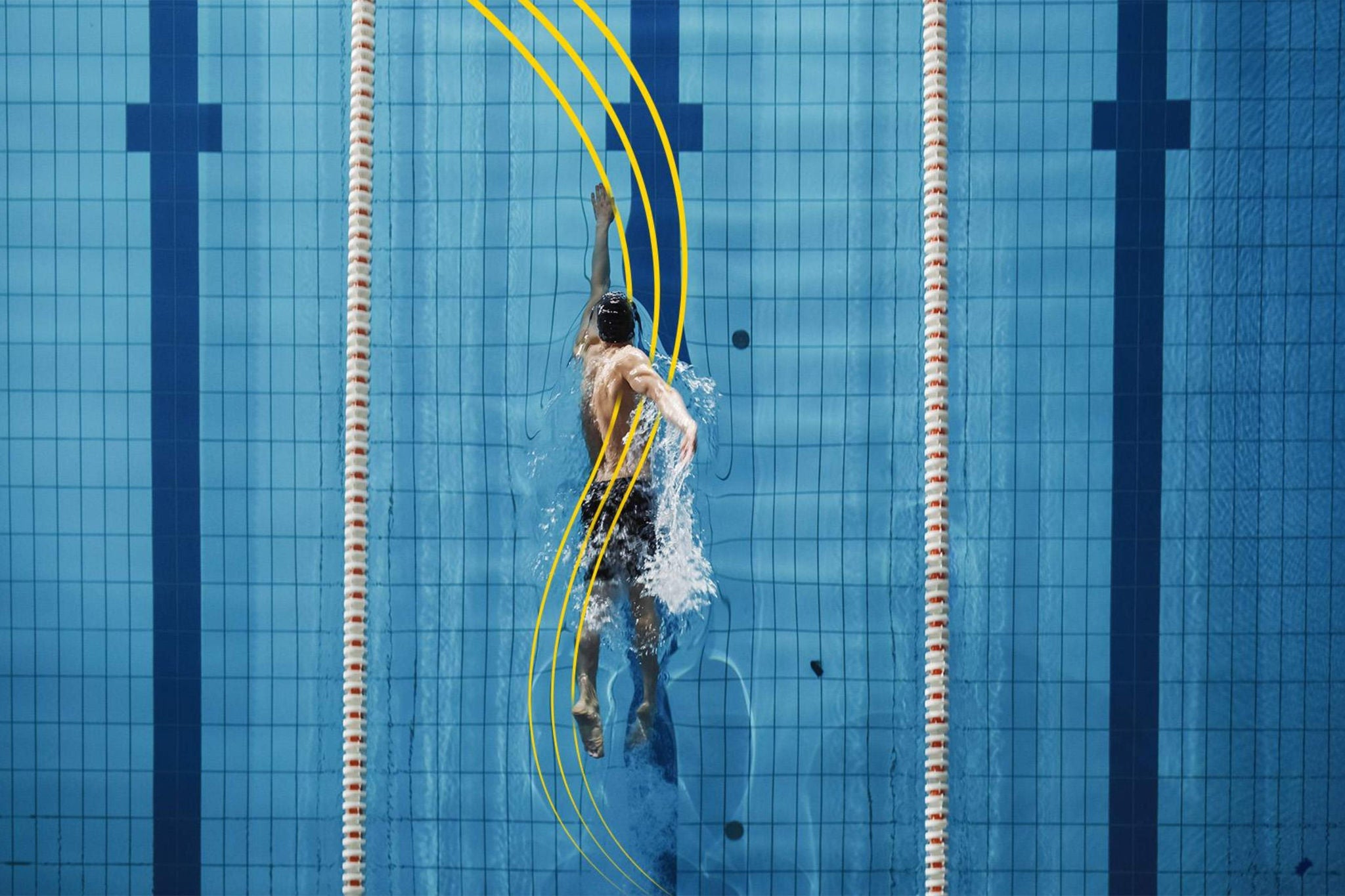 A man swimming in the pool