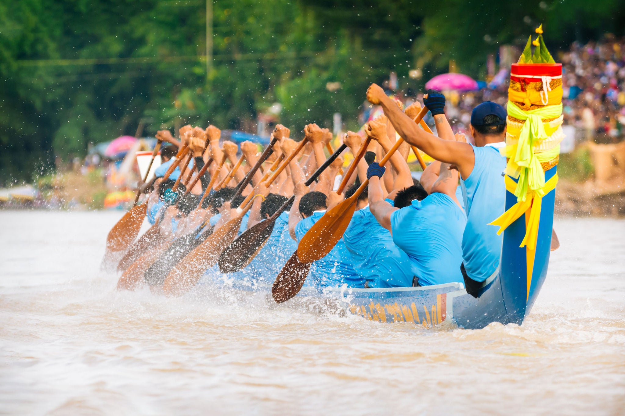 Close up of rowing team race