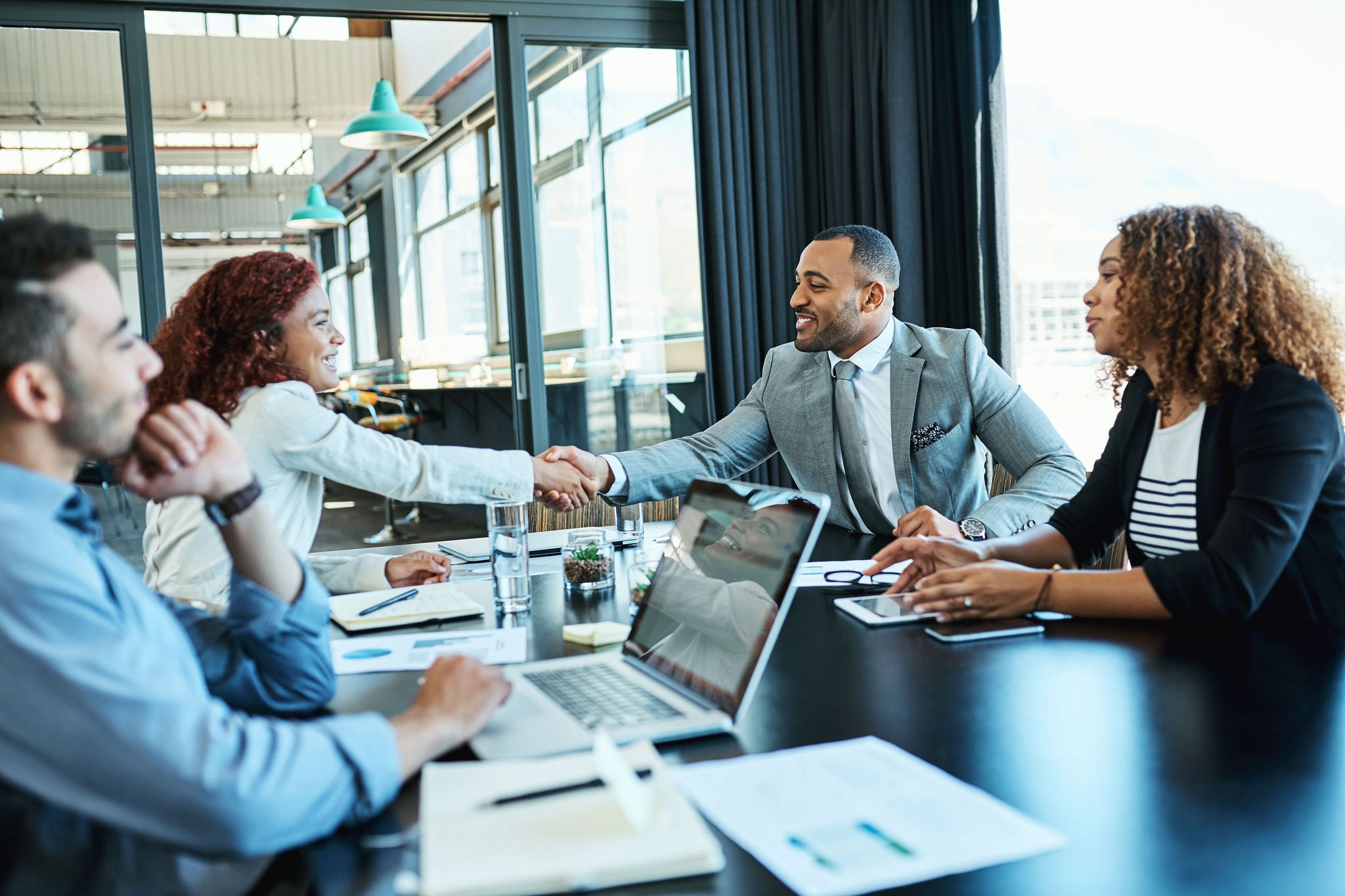 Employees are discussing each other on the table