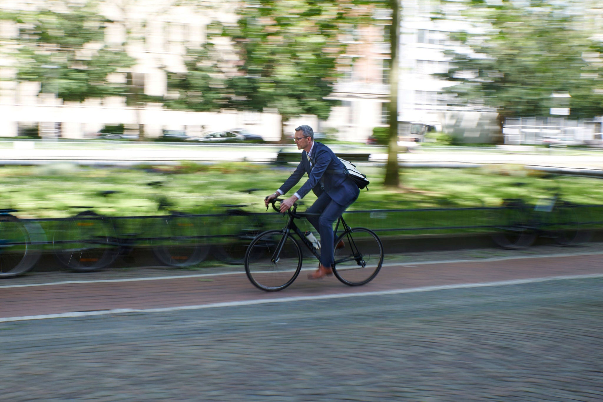 Man running a bycicle