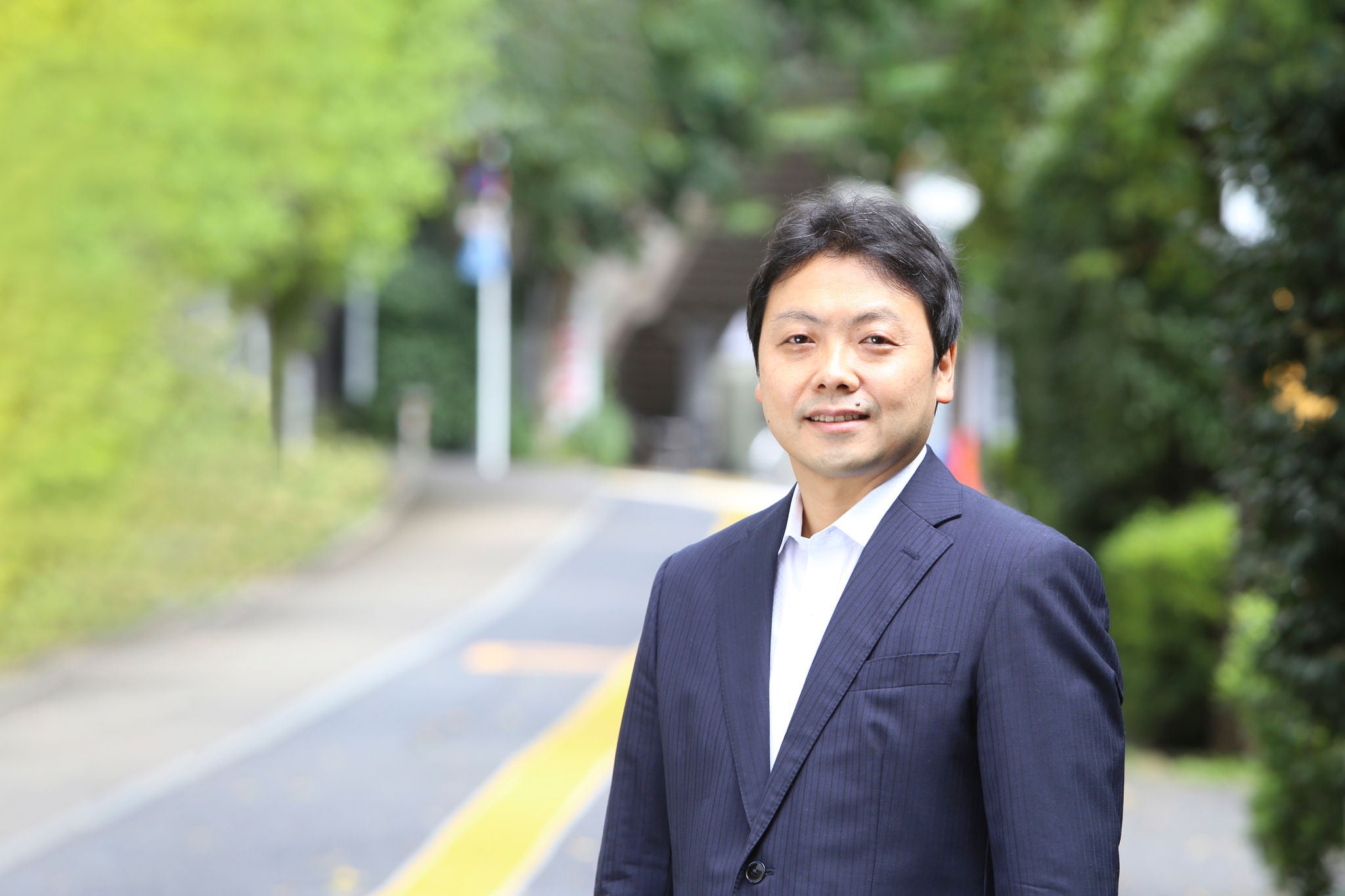 Photographic portrait of Shinichiro Uzawa