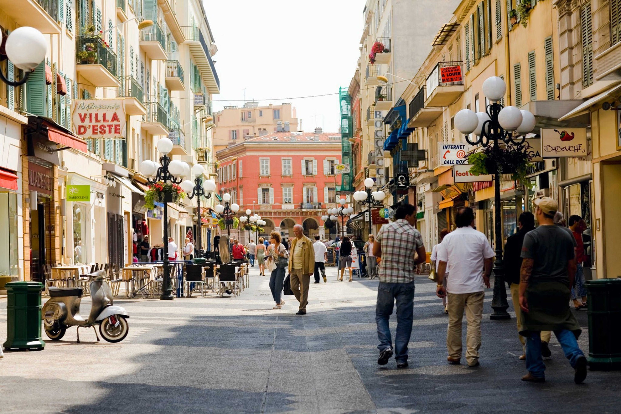 Shopping street filled with pedestrians