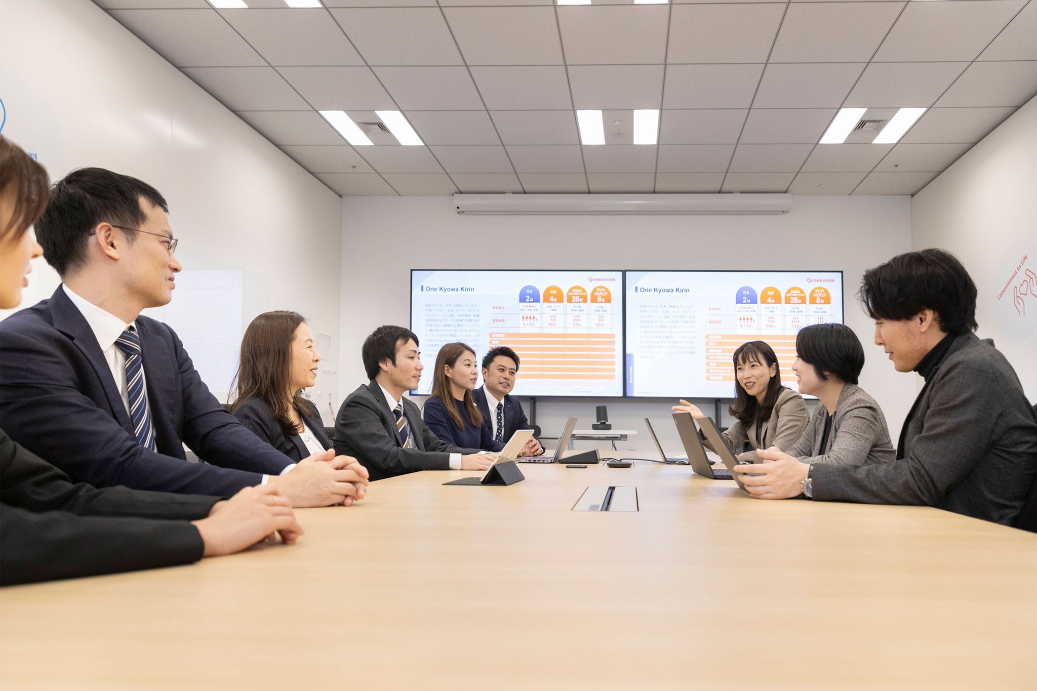 Noriko ishizaka leads a meeting at kyowa kirin