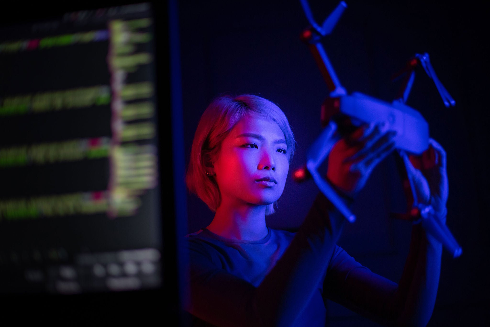 Female engineer working on drone technology