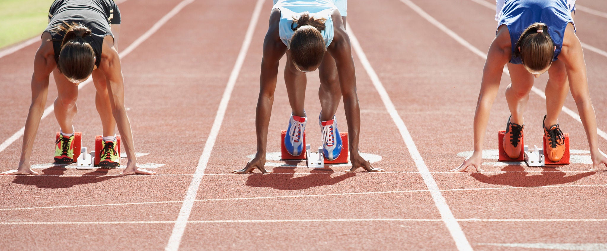 runners in starting blocks