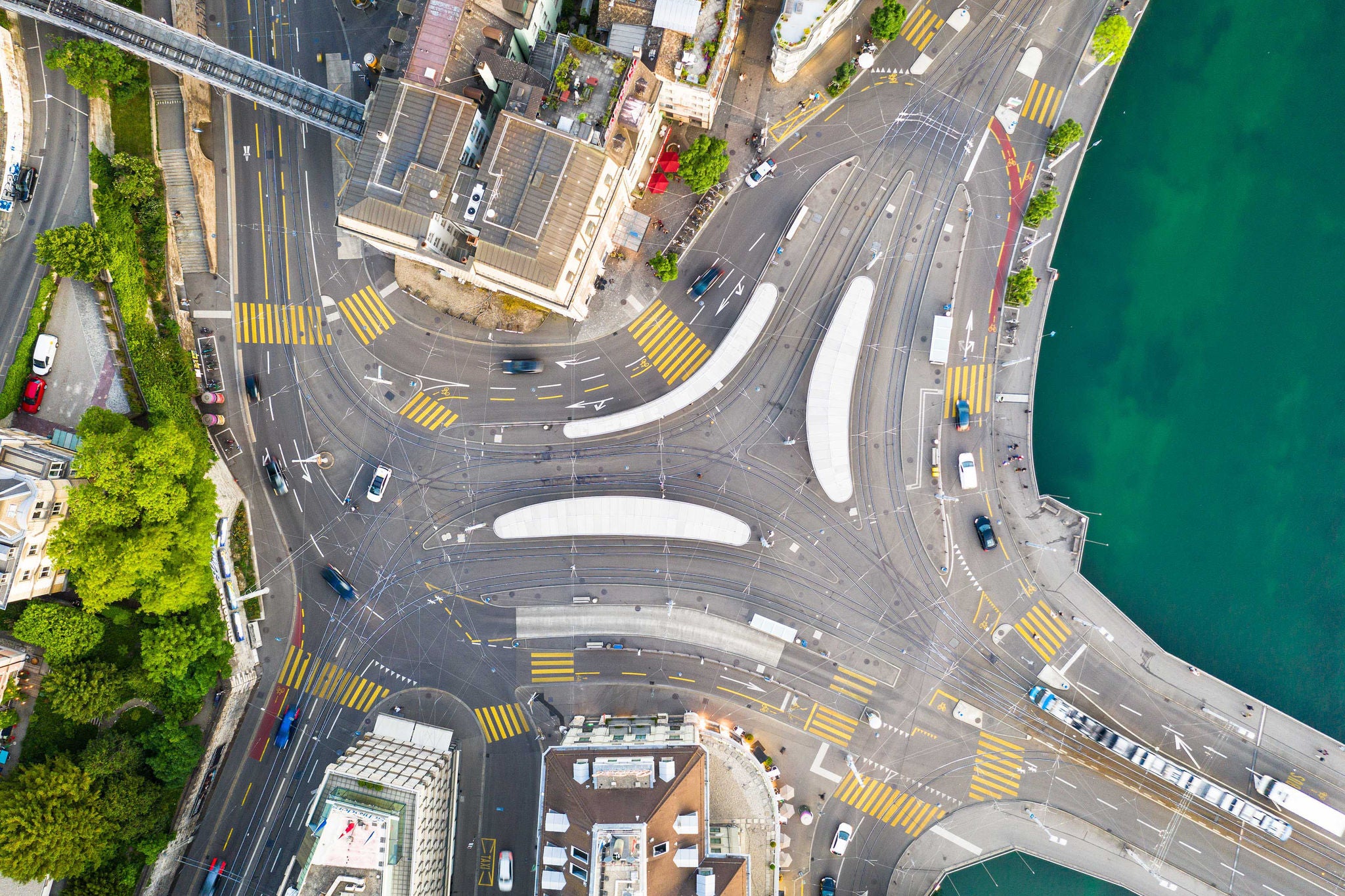 Top down view of a road intersection with tram stops in Zurich, Switzerland largest city