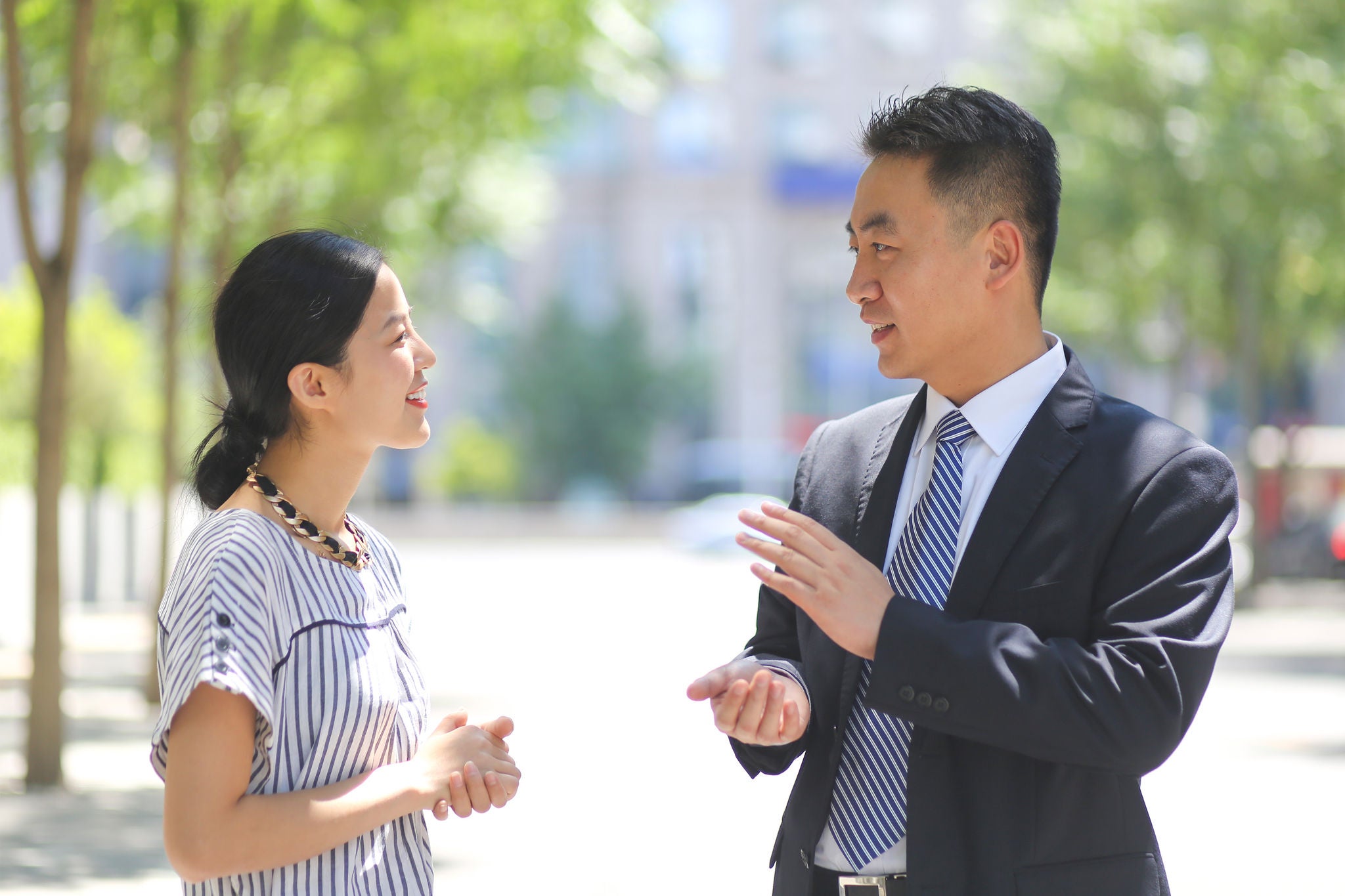 Asian business people talking outdoor