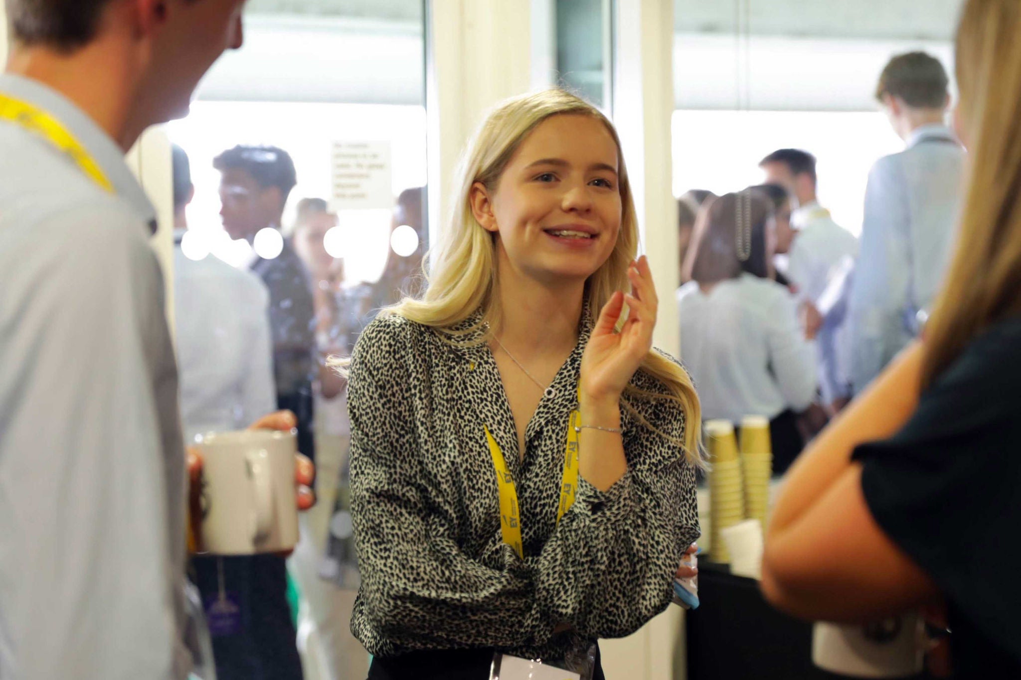 Colleagues at a Student event chatting