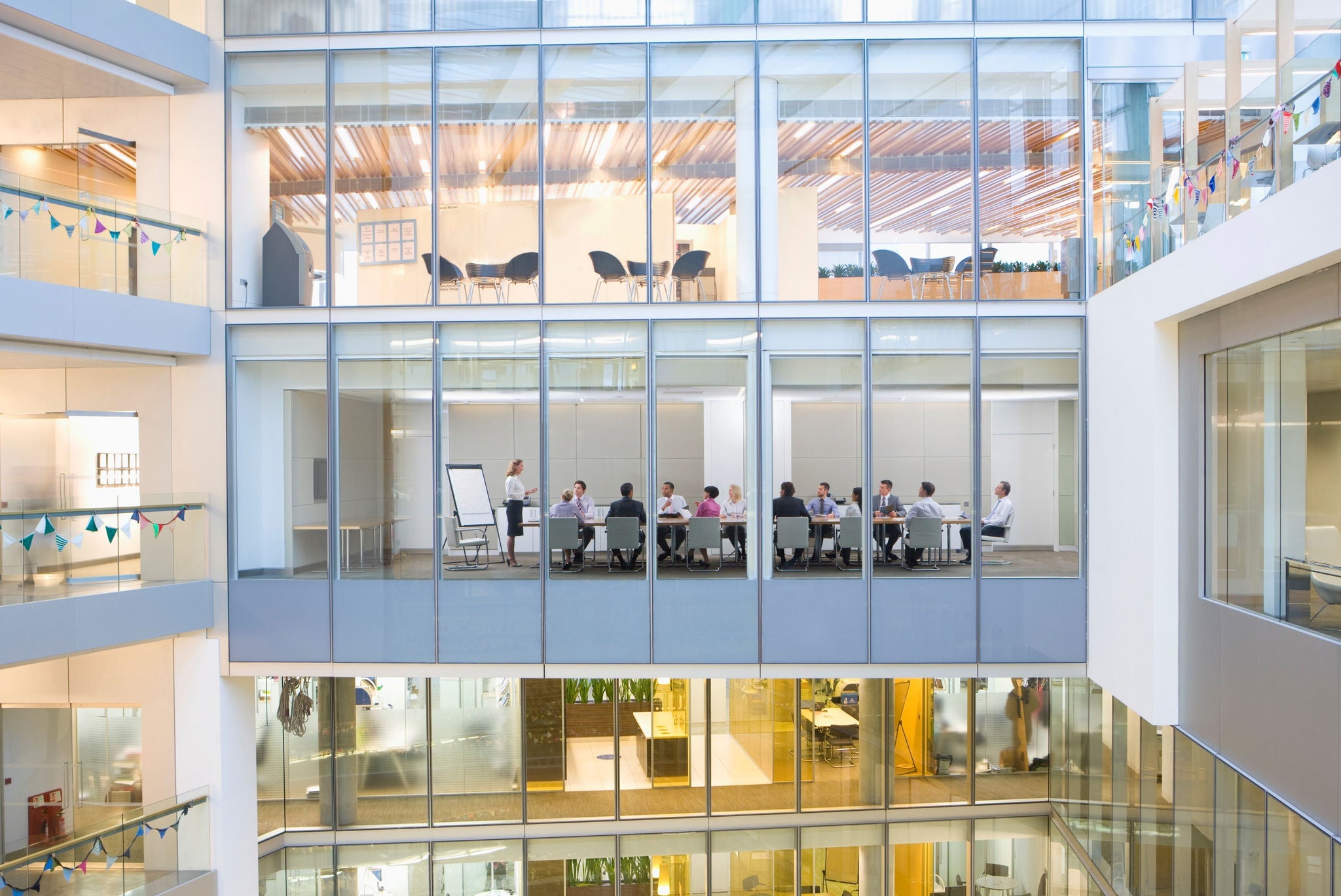 Employees attending meeting in office