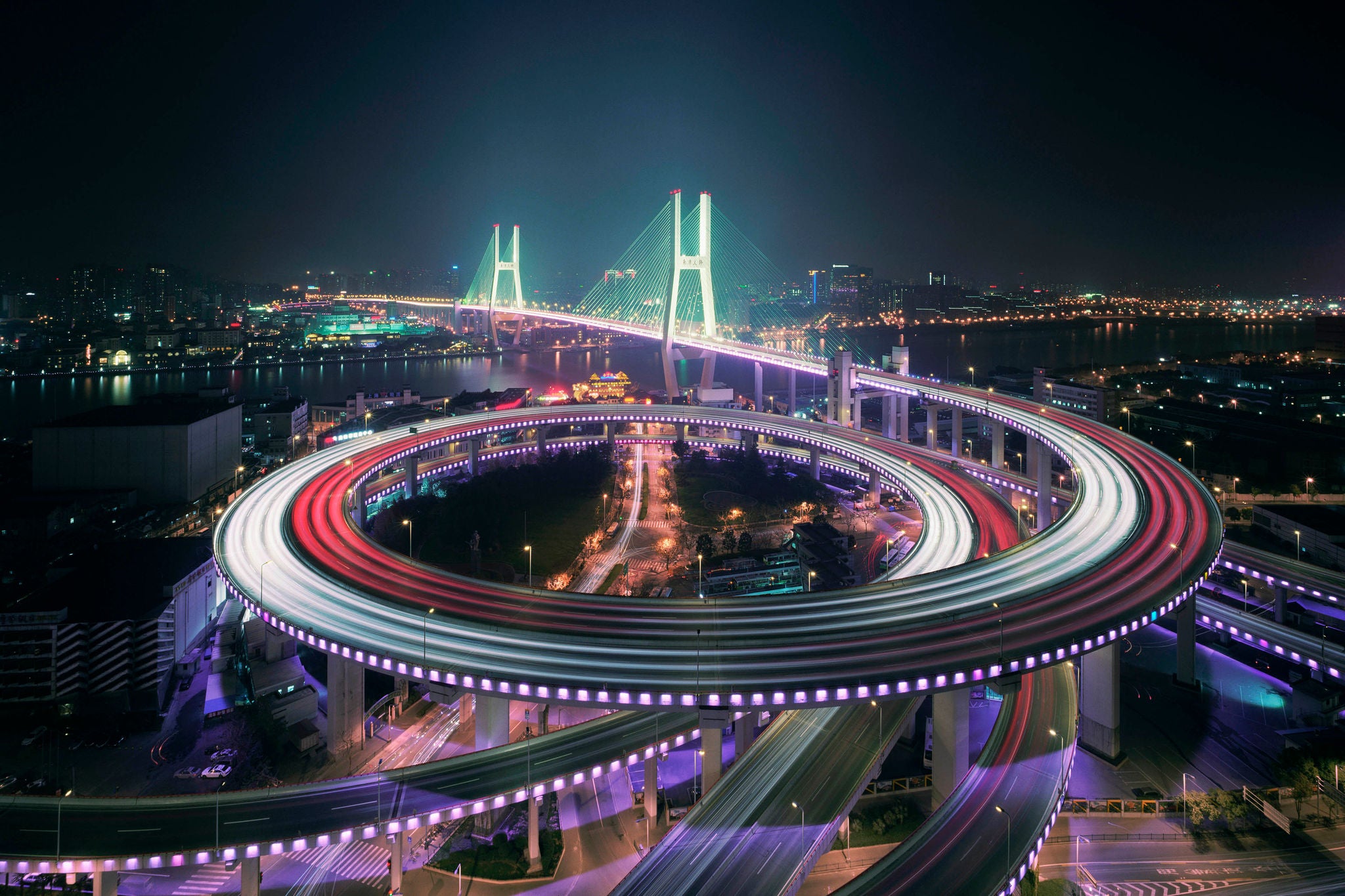 Asia, China, Shanghai, Nanpu bridge illuminated at night, elevated view.