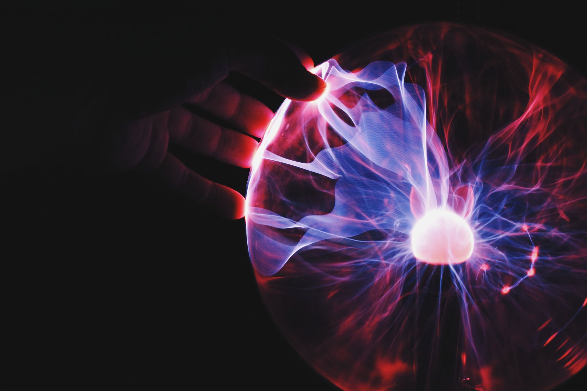 Human holding plasma ball