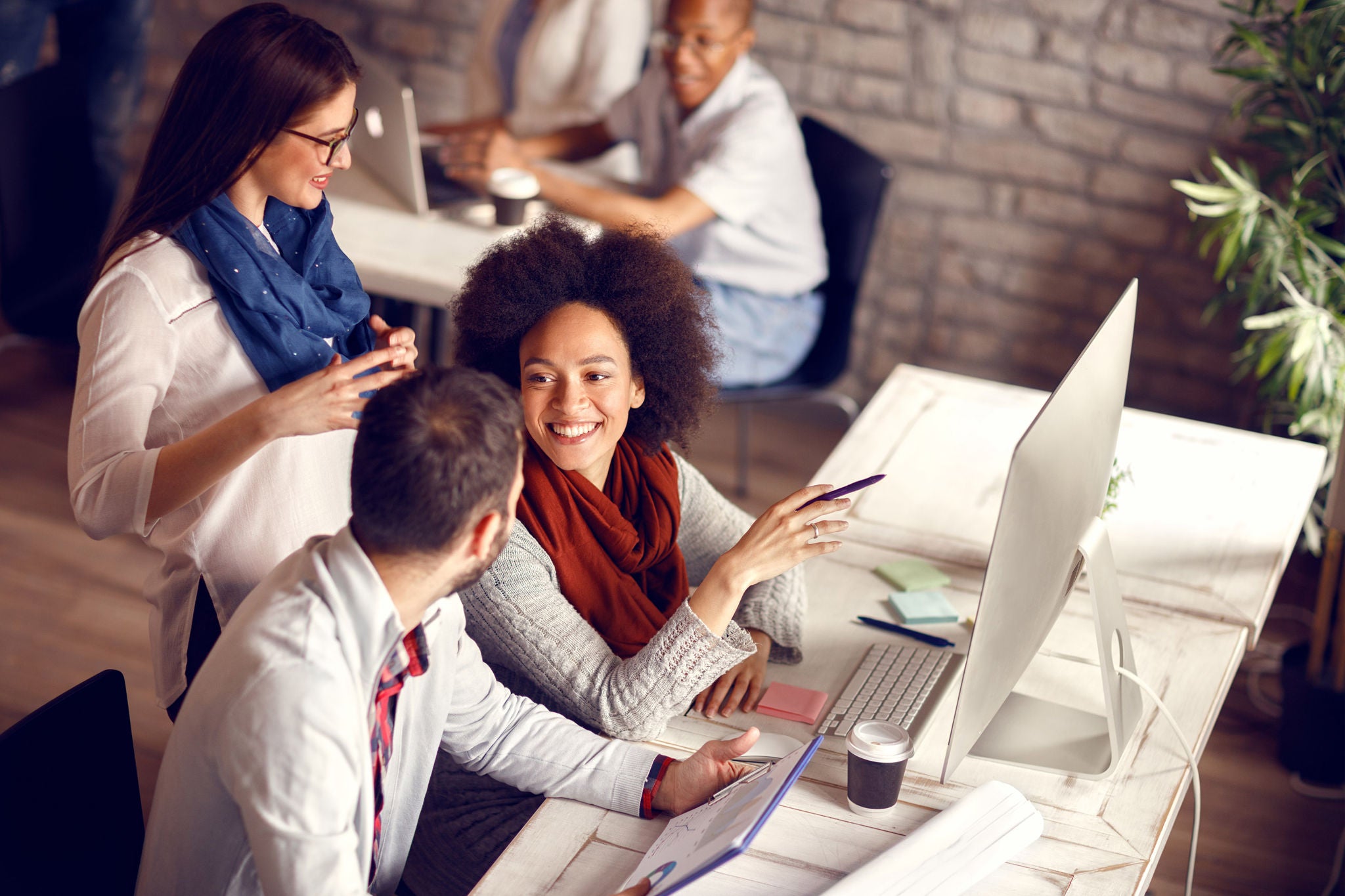 Young employees in office