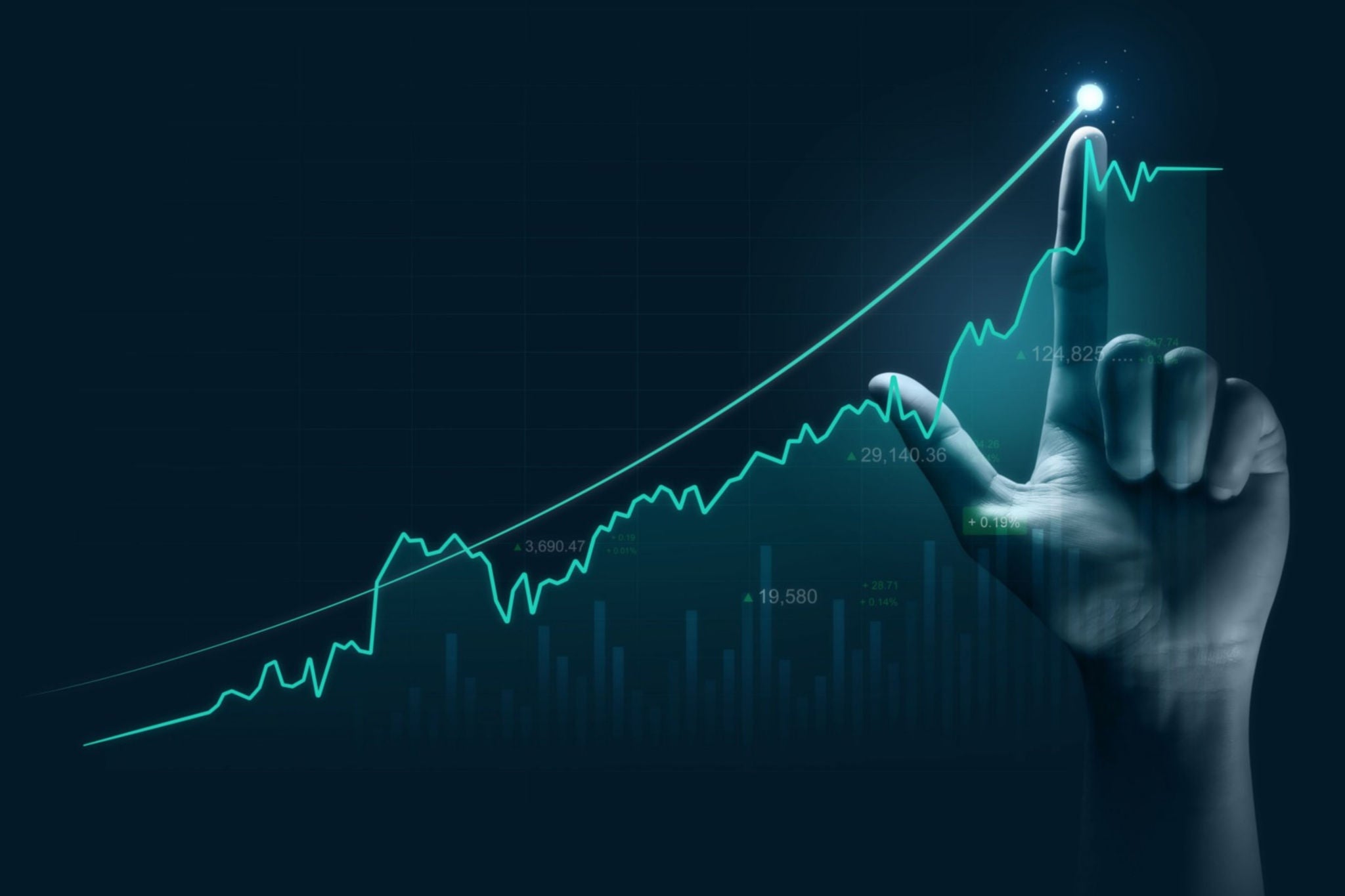 A finger pointing to maximum point in a  graph on a digital screen 