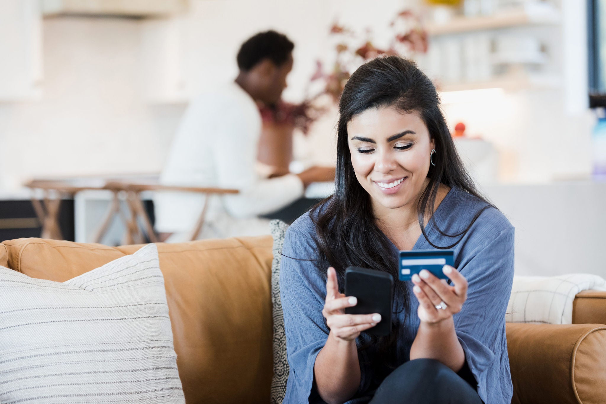 While husband works, wife uses credit card for purchase