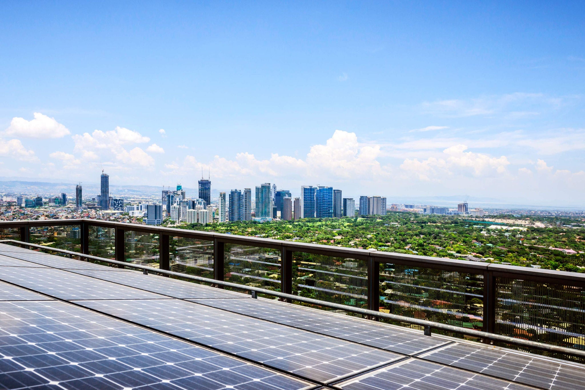 Solar panels getting recharged on high-rise towers