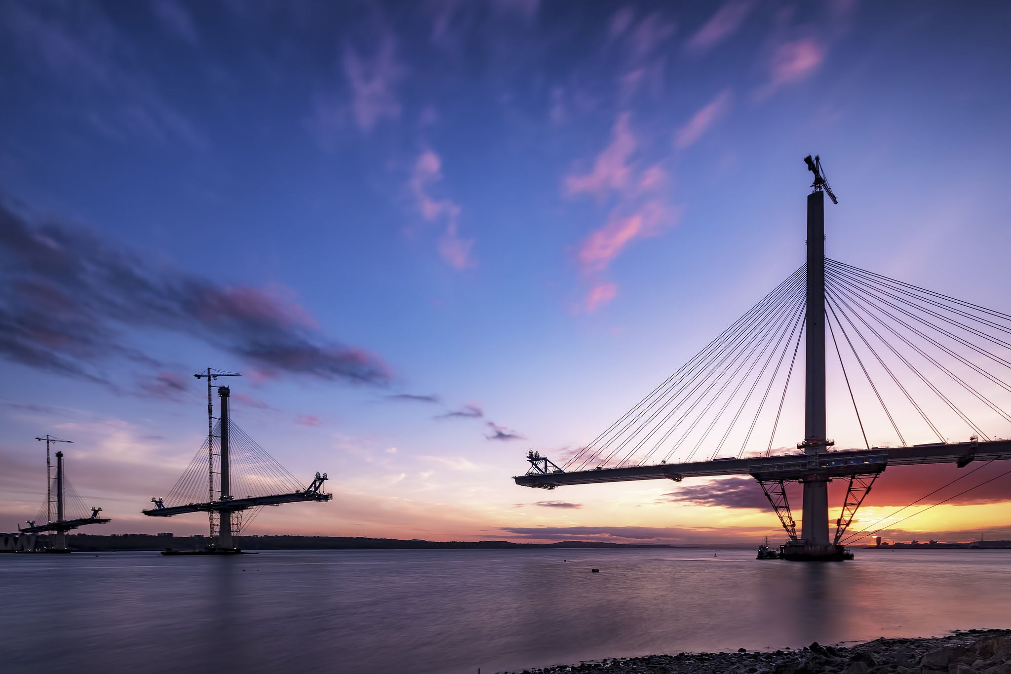 Scotland, Construction of the Queensferry Crossing Bridge at sunset