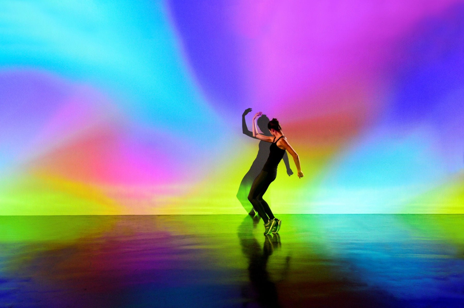 ey-ua-women-near-colourful-wall