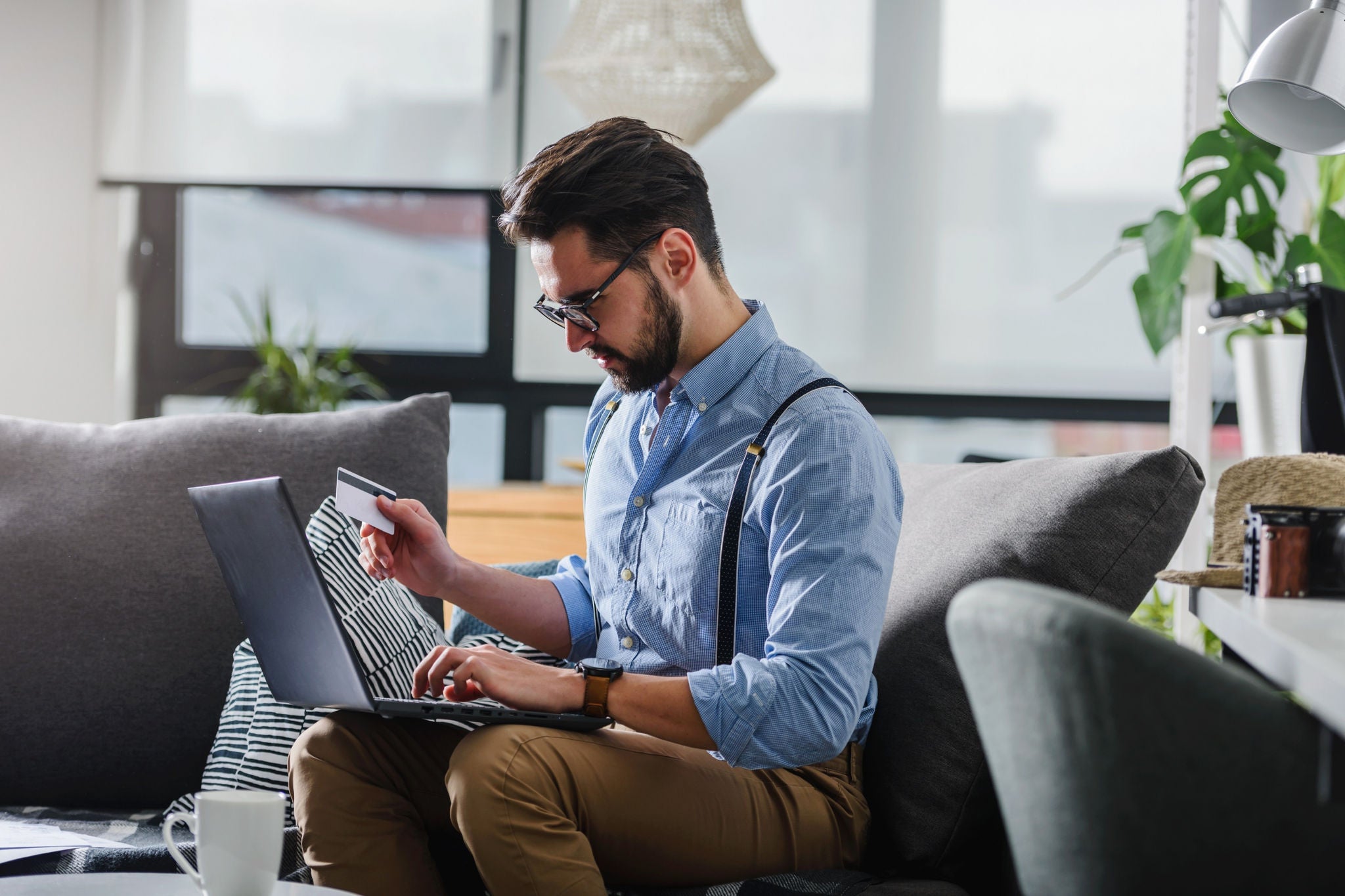 Man working in laptop.