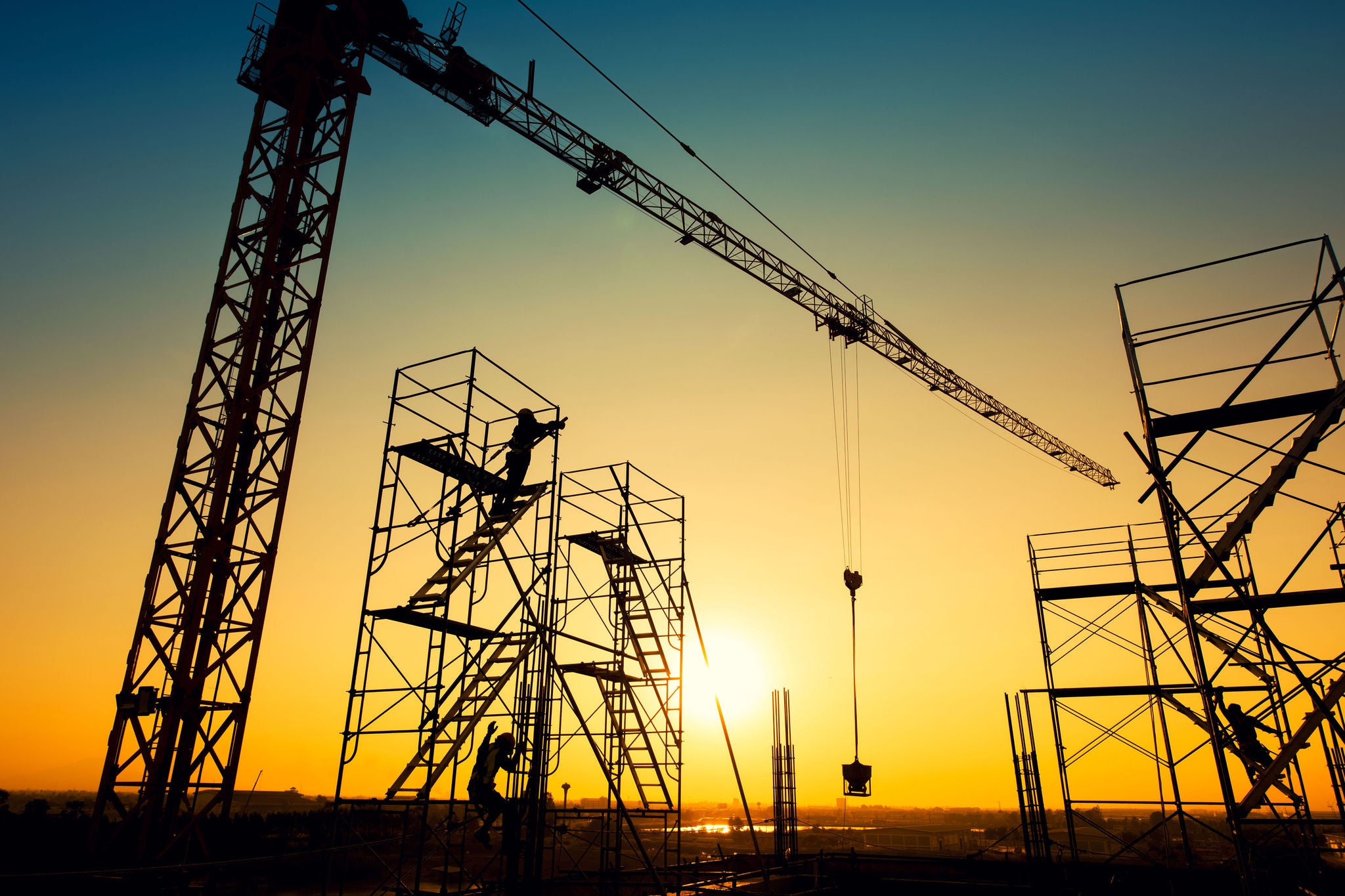 Low angle view of crane in building construction