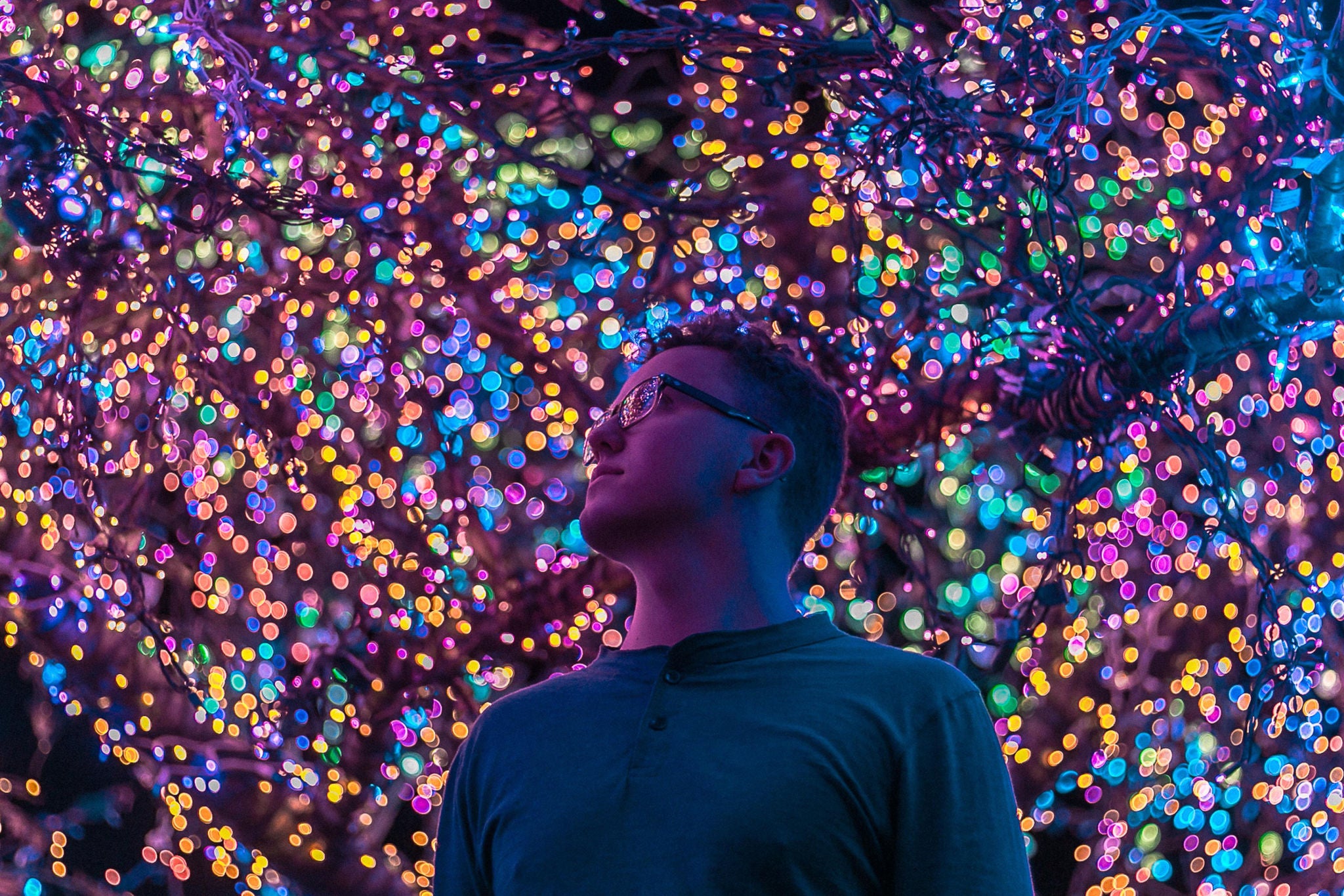 Man-standing-under-lights