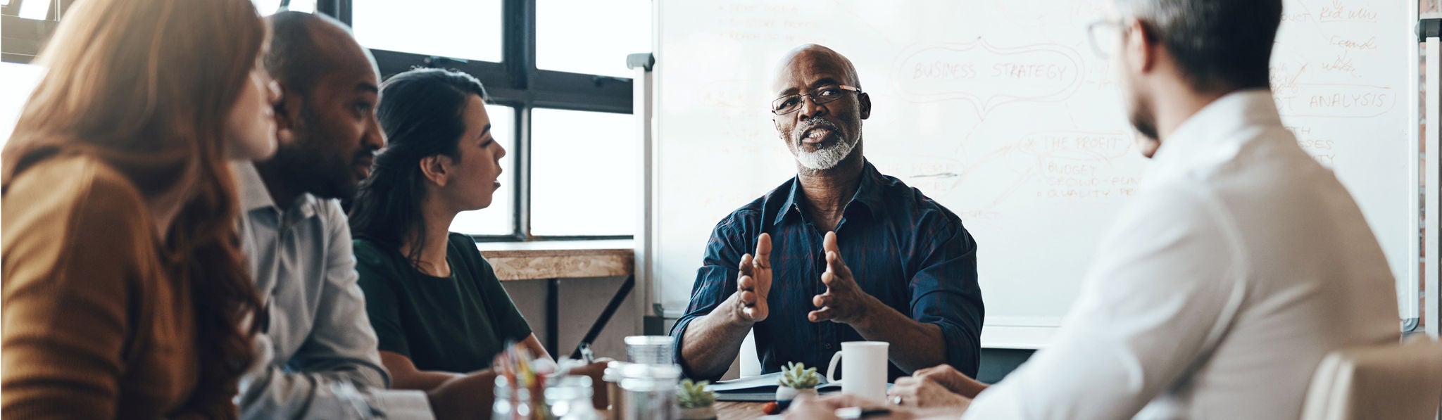 business meeting in boardroom with discussion for financial growth