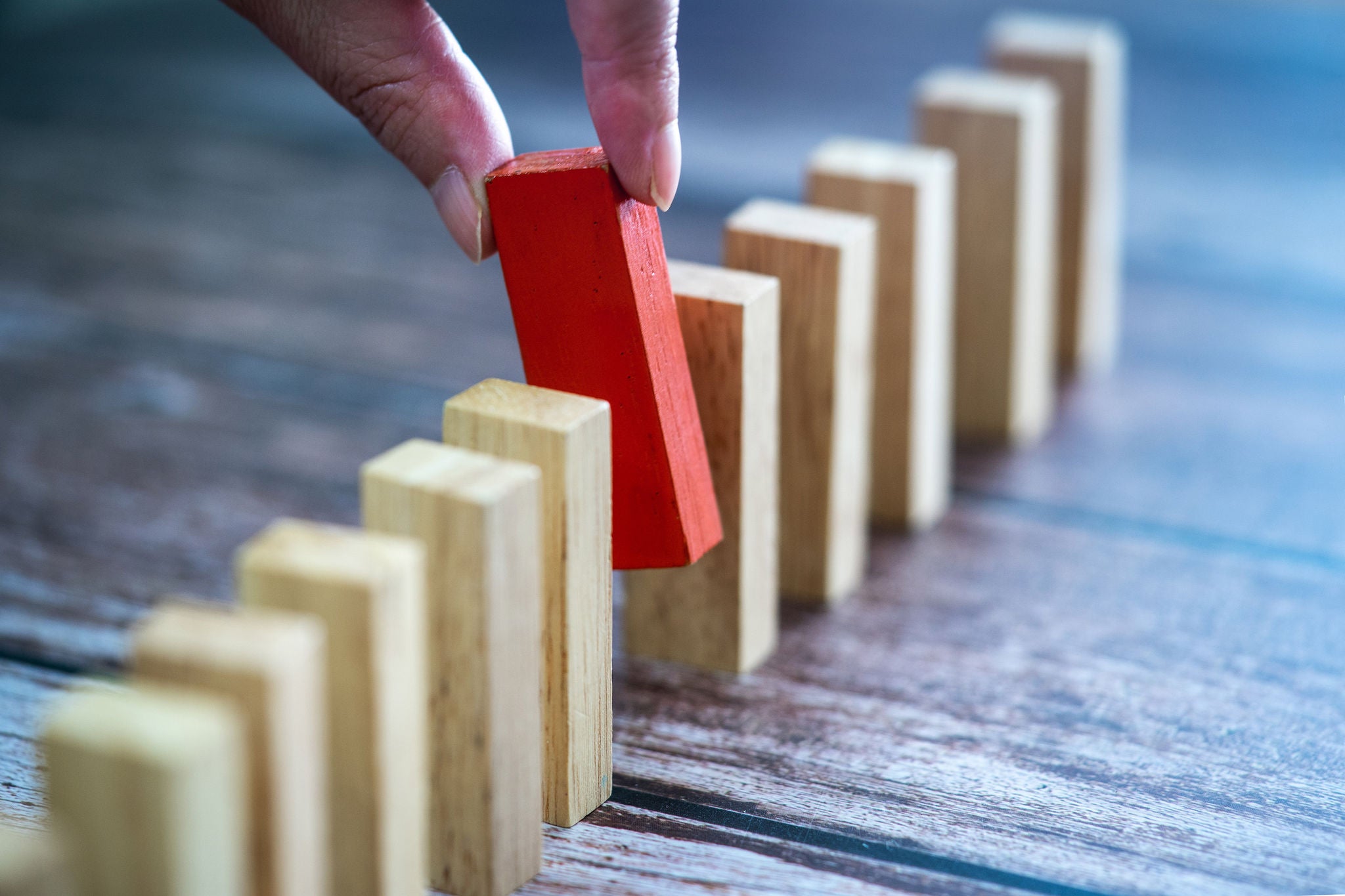 Domino,Wooden block,Business risk, strategy and planing concept idea.