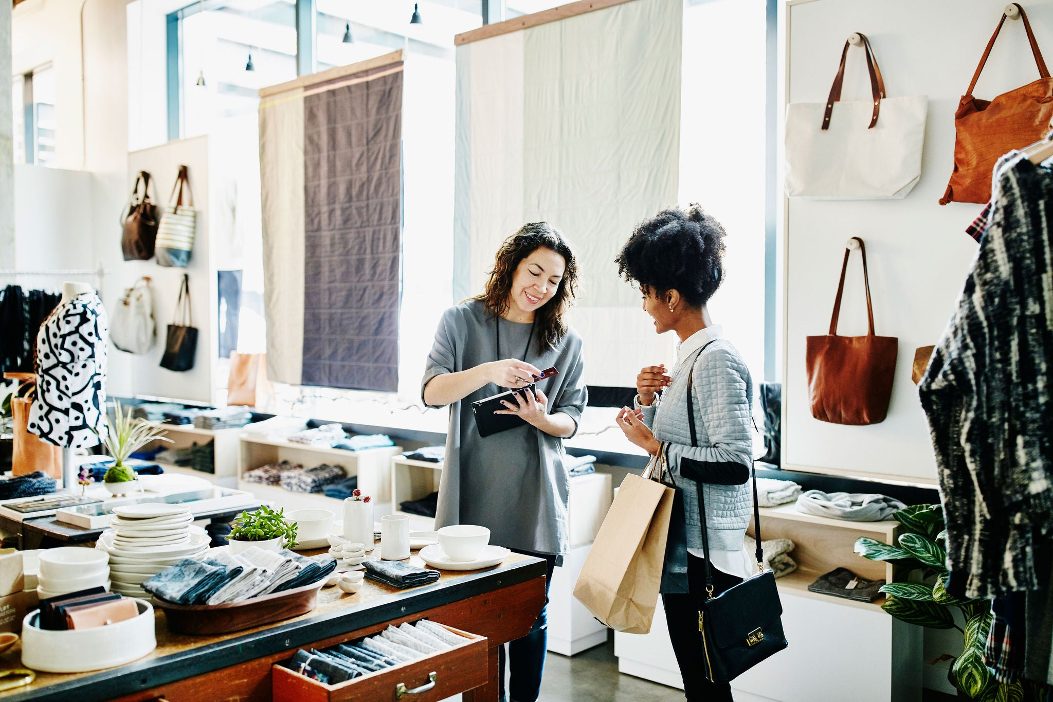 ey-two-women-talking-in-a-shop.jpg