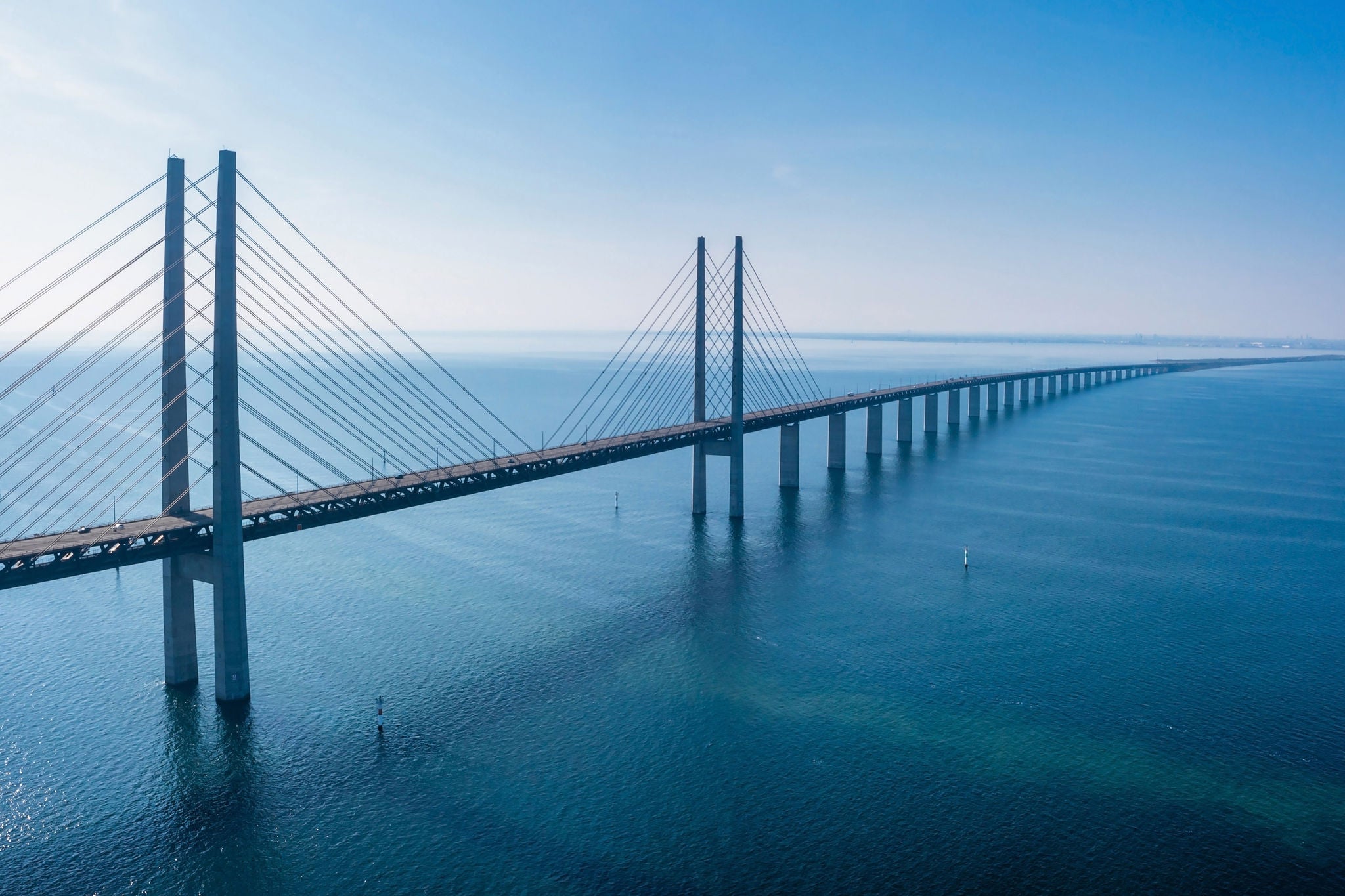 Panoramic aerial view of the Oresundsbron bridge between Denmark and Sweden.. Oresund Bridge view at sunset.