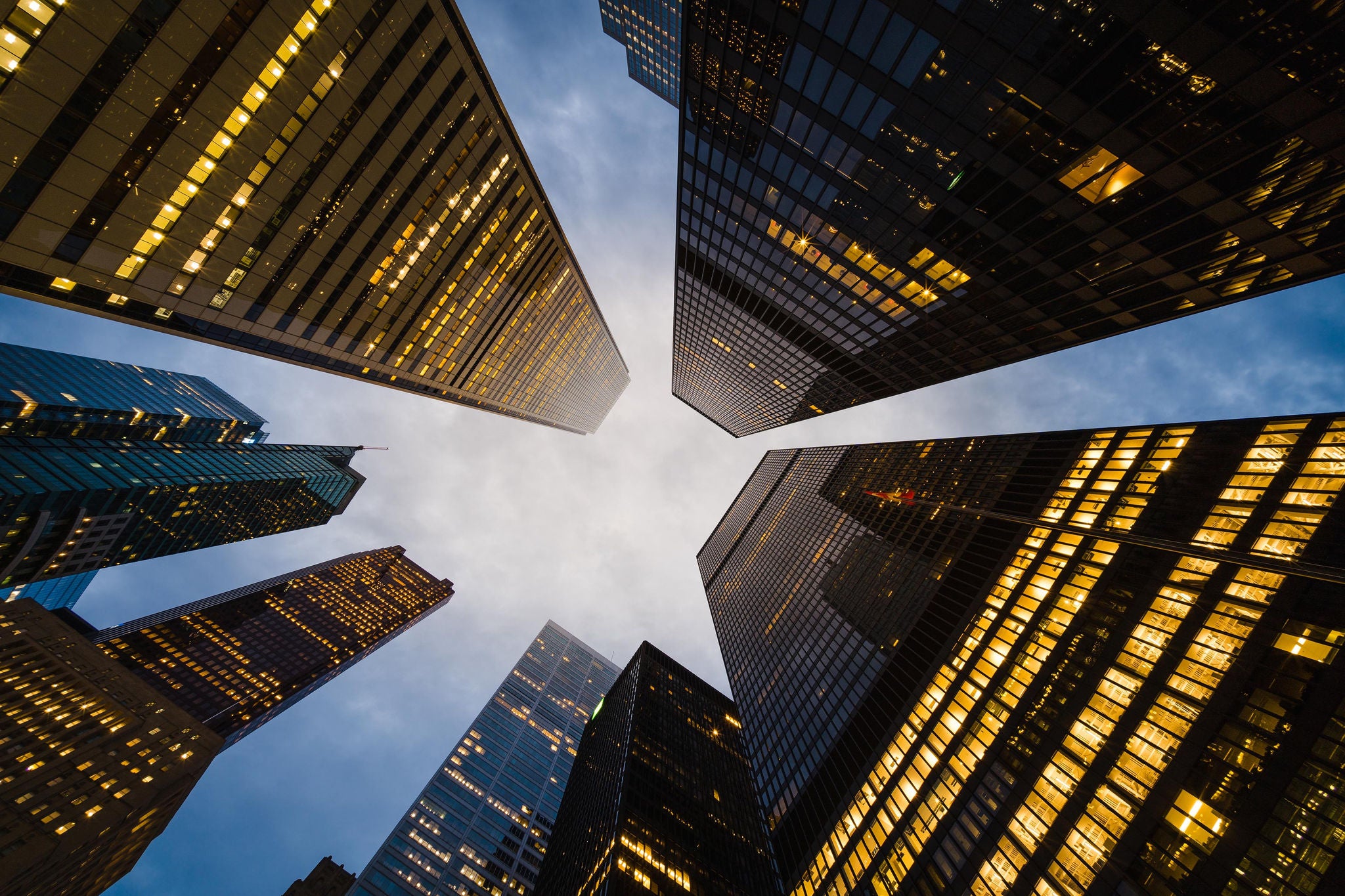 ey-looking-up-at-buildings-in-financial