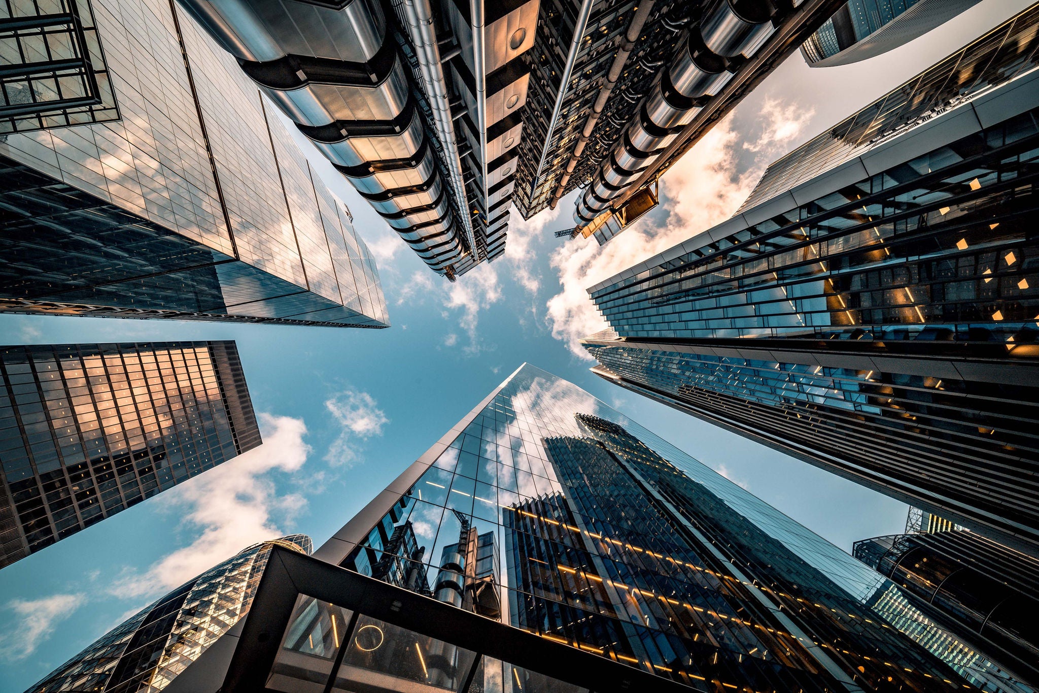 Wide angle view up towards the sky of London