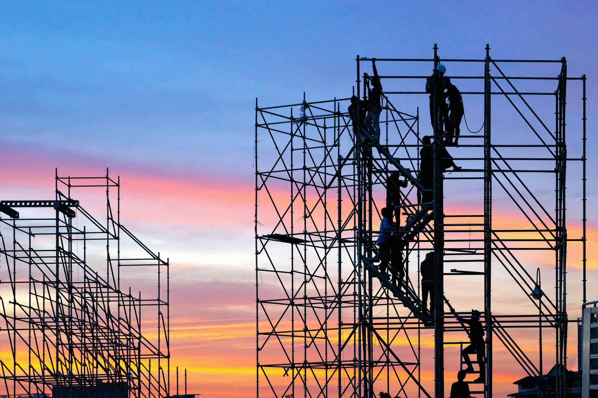 engineers working on construction scaffolding