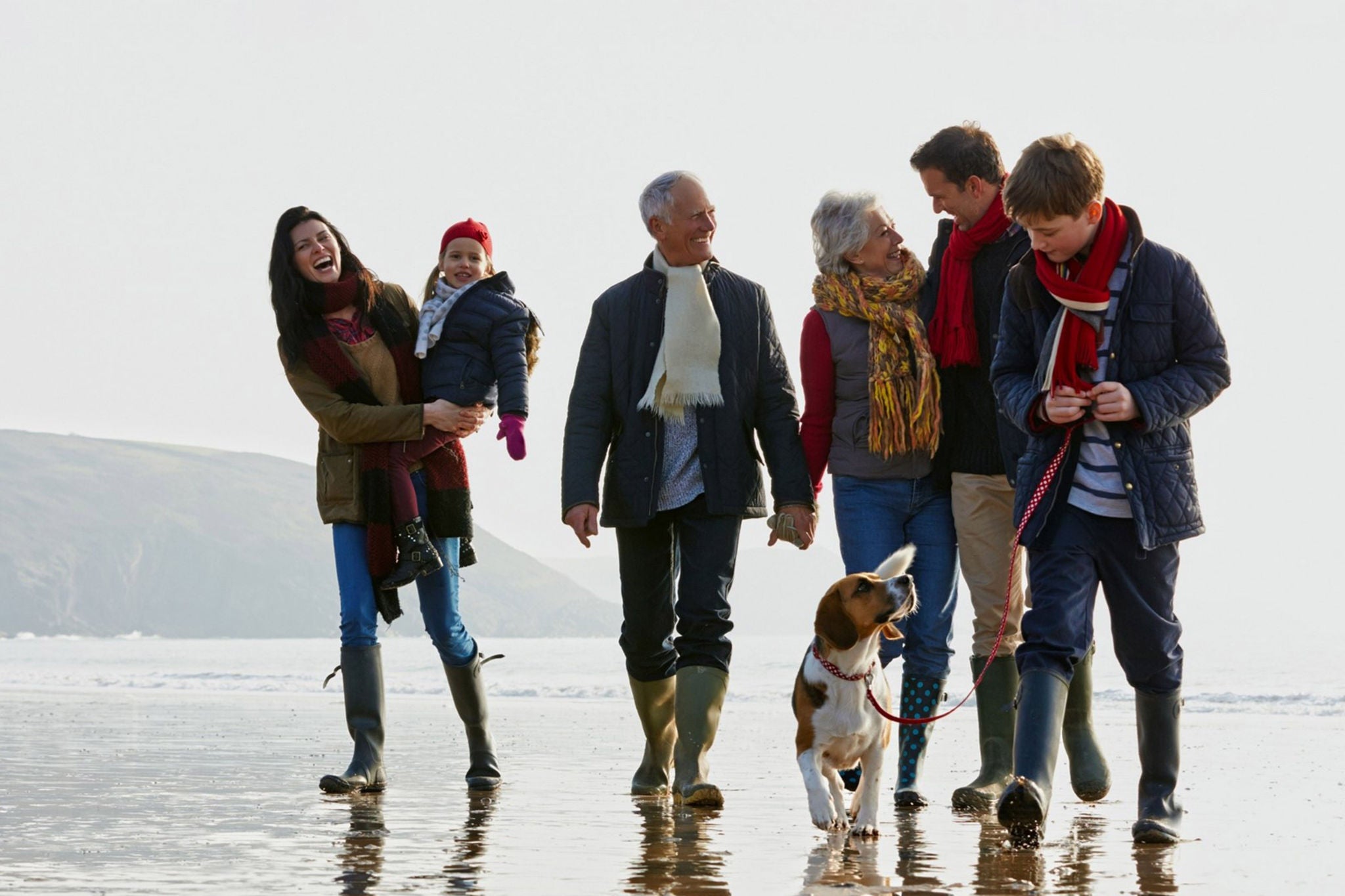 Family walking at beach