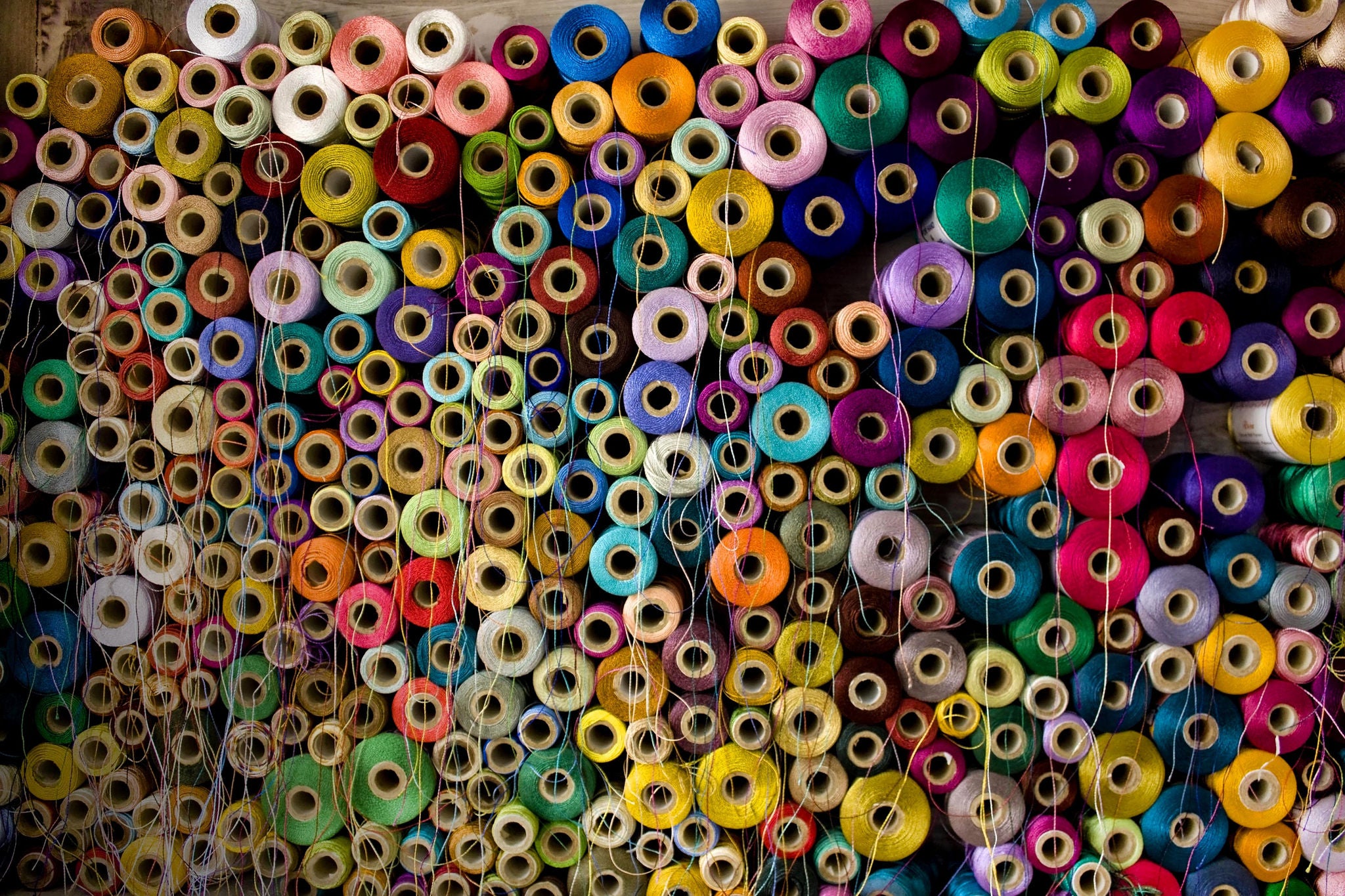 Colorful cotton and silk thread reels.