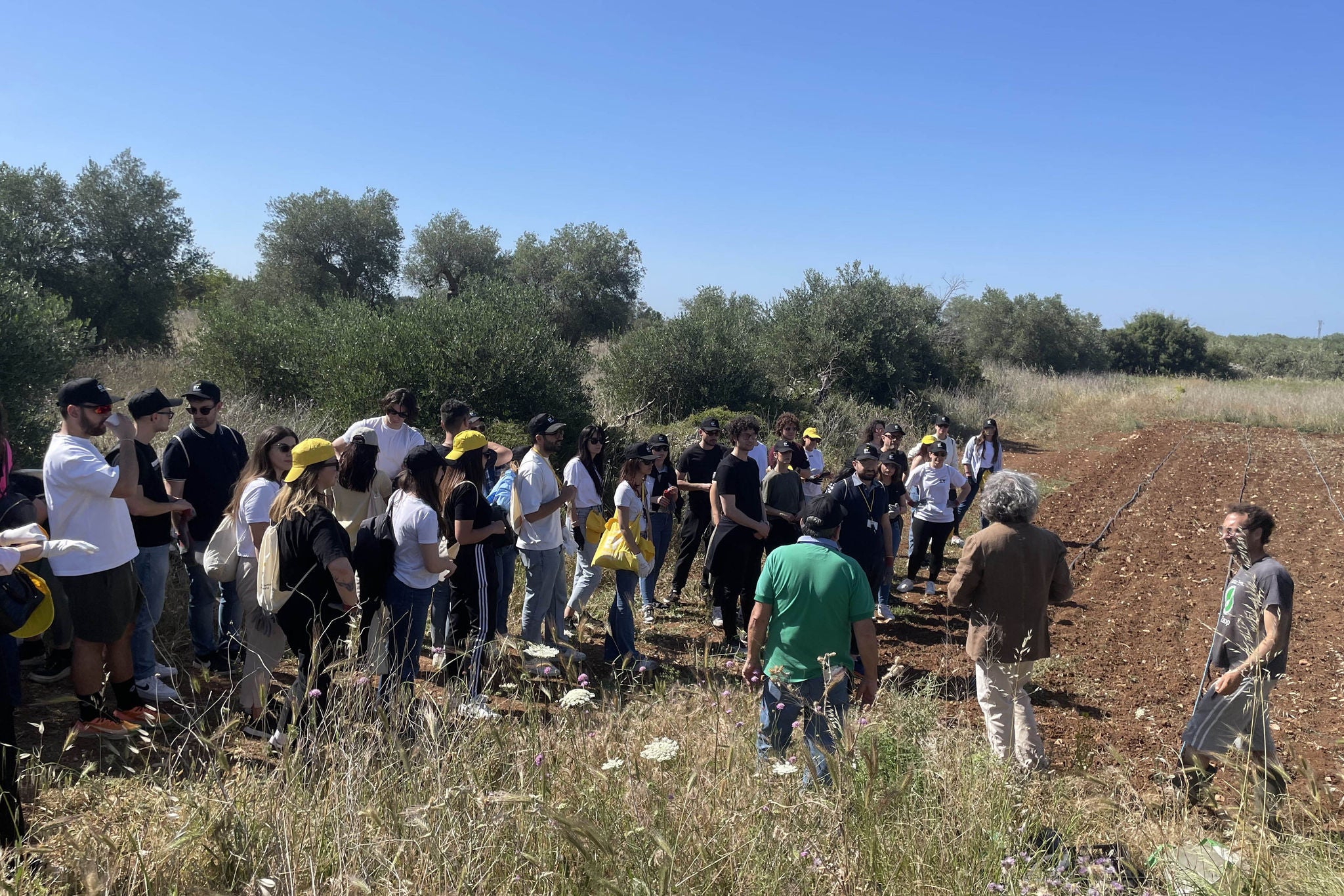 A group of people in field