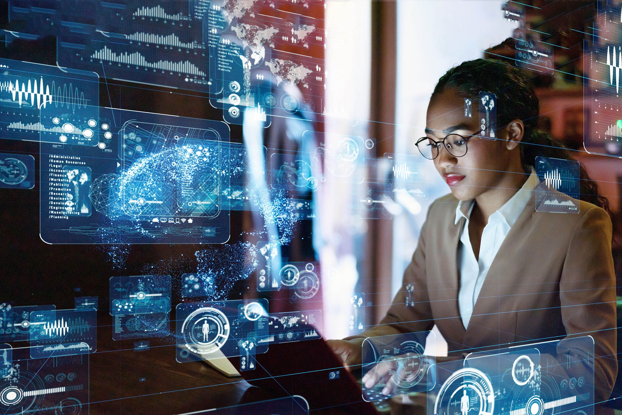 Woman with computer at desk version