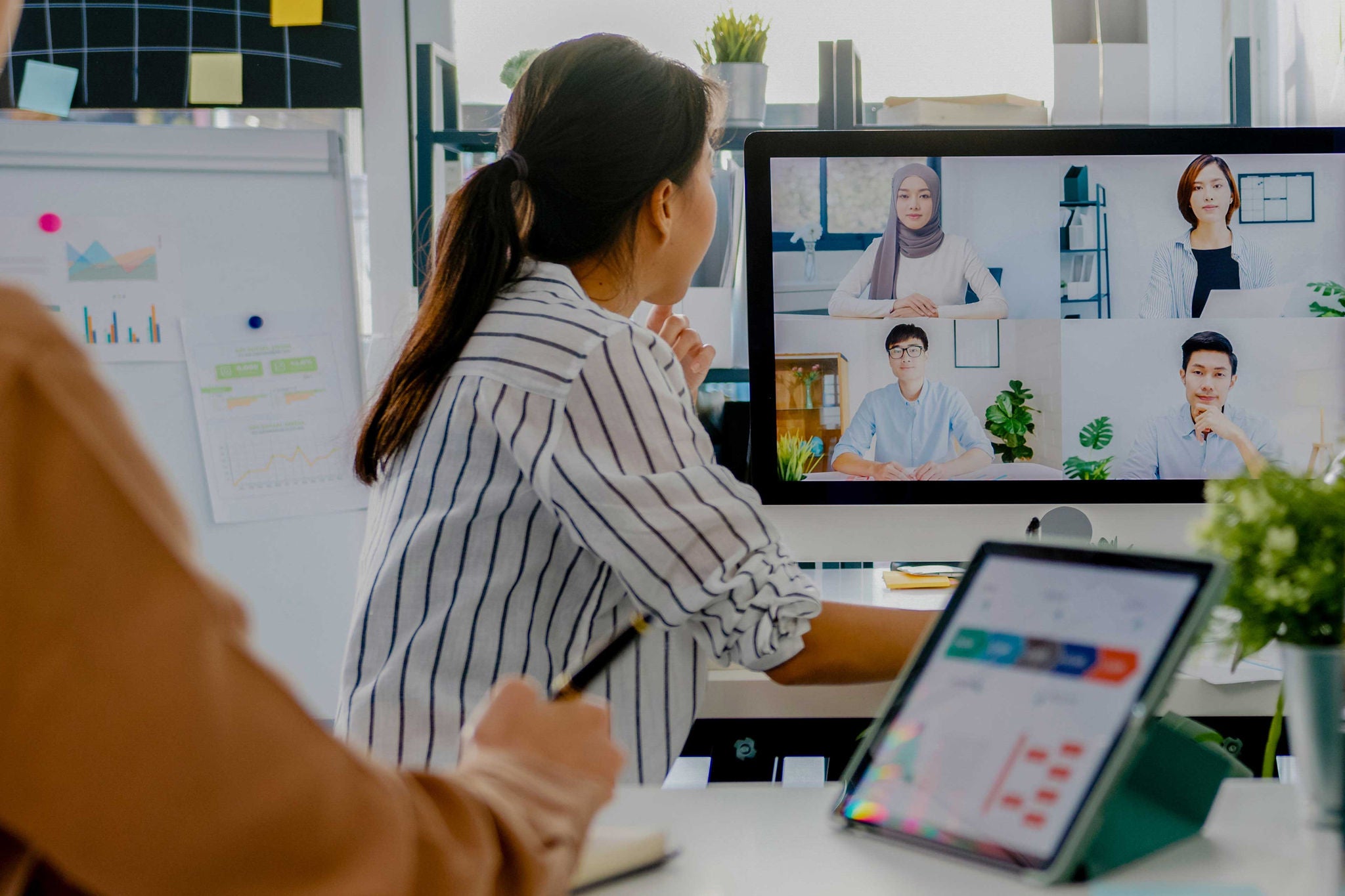 woman attending an online meeting