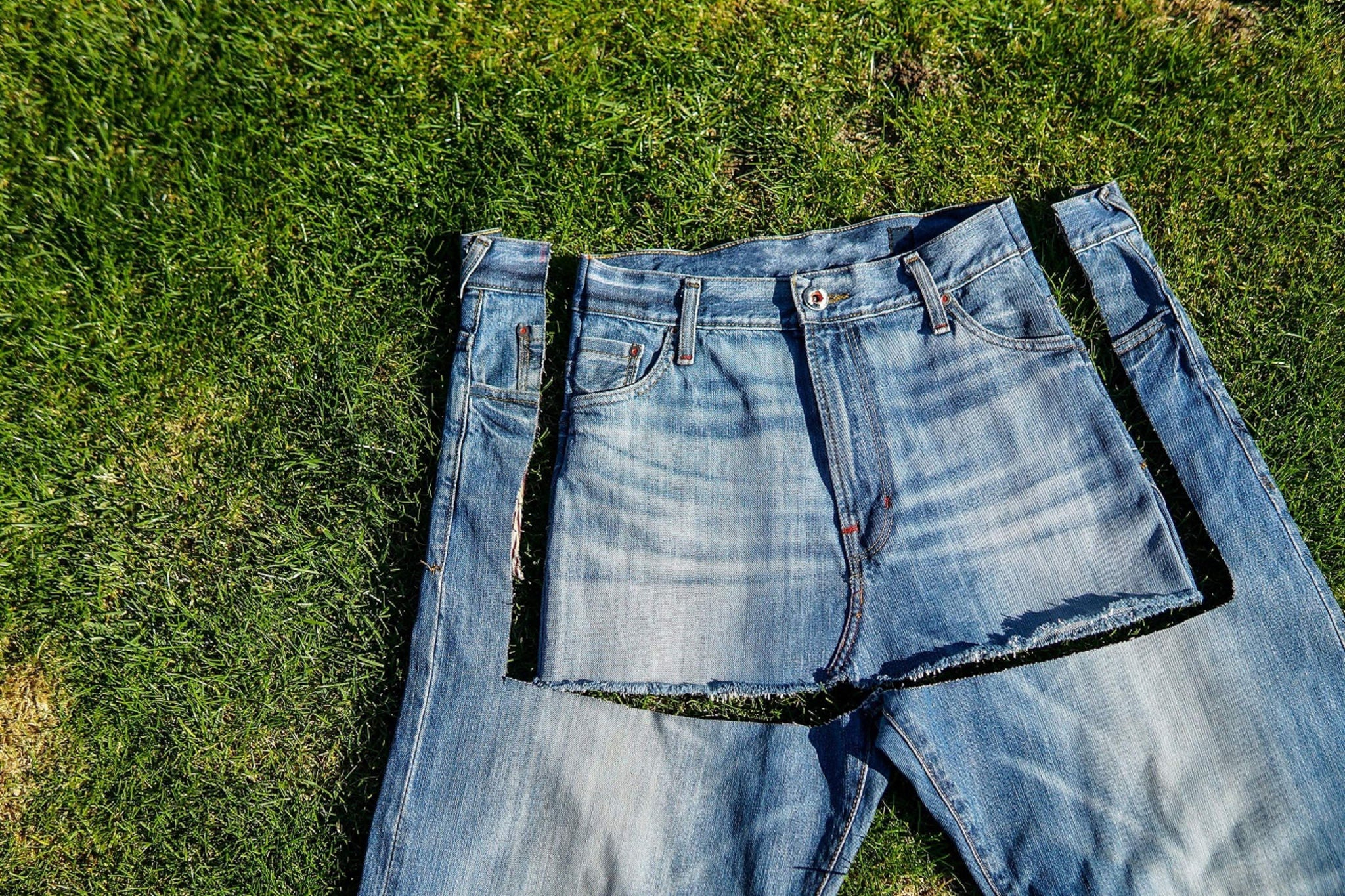 Recycle, reuse, repurpose, upcycle, upgrade concept. New life to old things, make your own clothes from boyfriend jeans