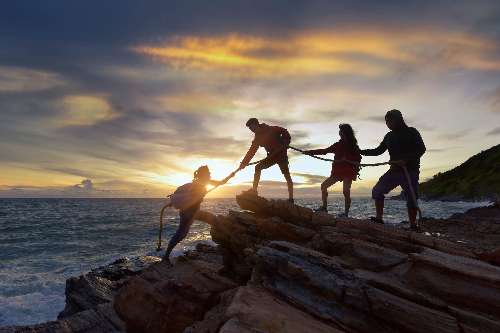 People are climbing a mountain 