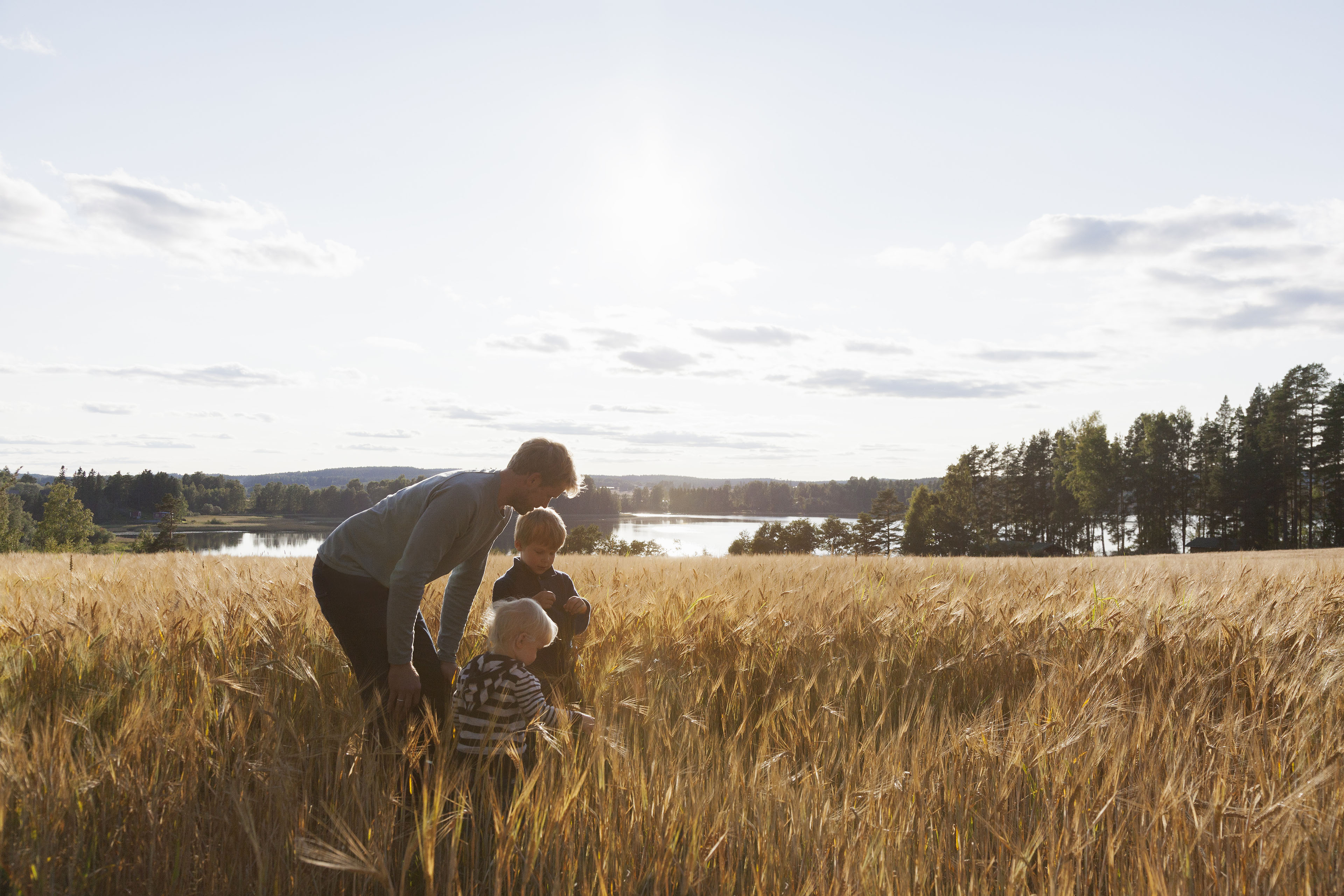 Father and son in field