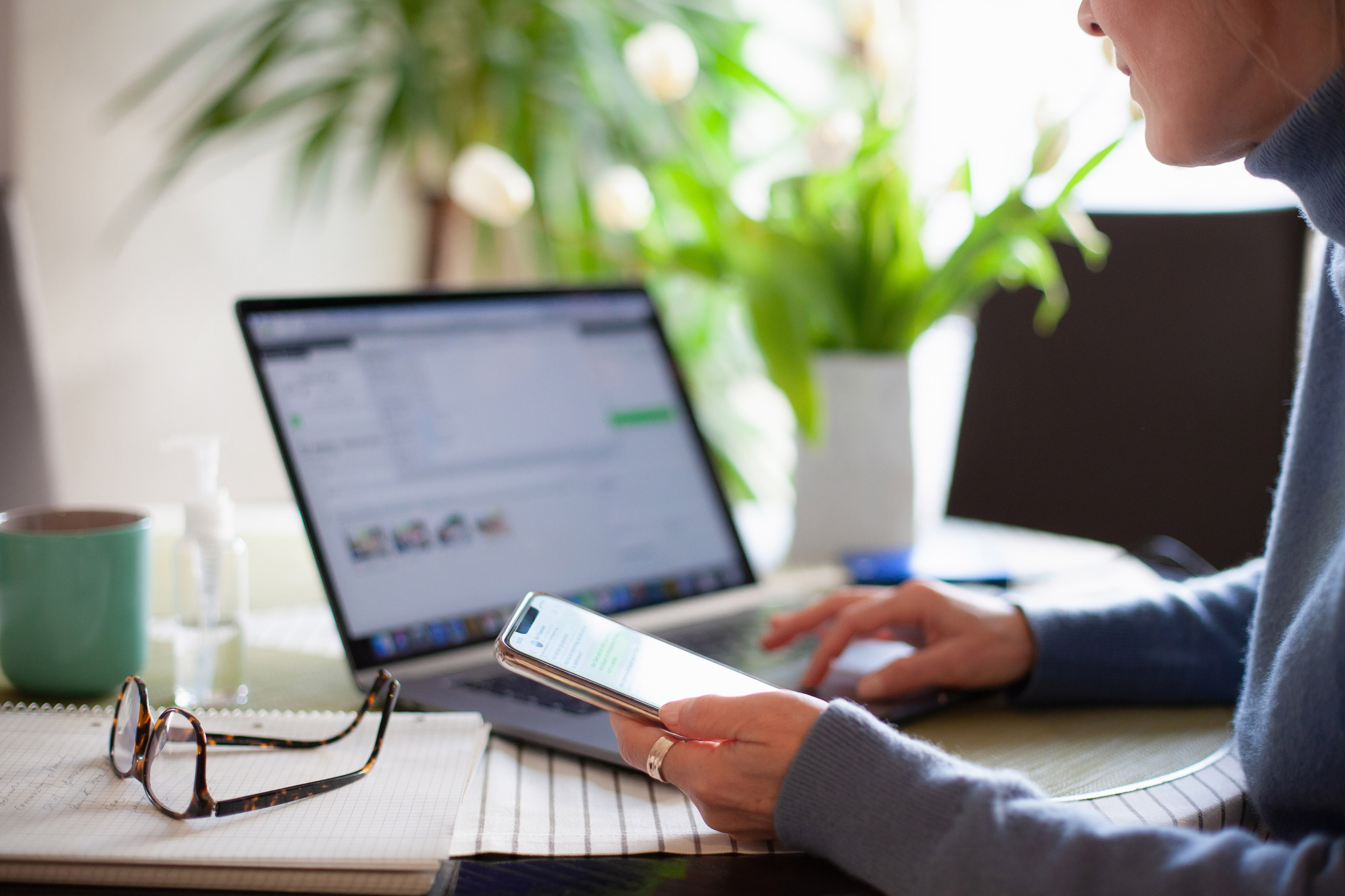 Woman working from home using laptop