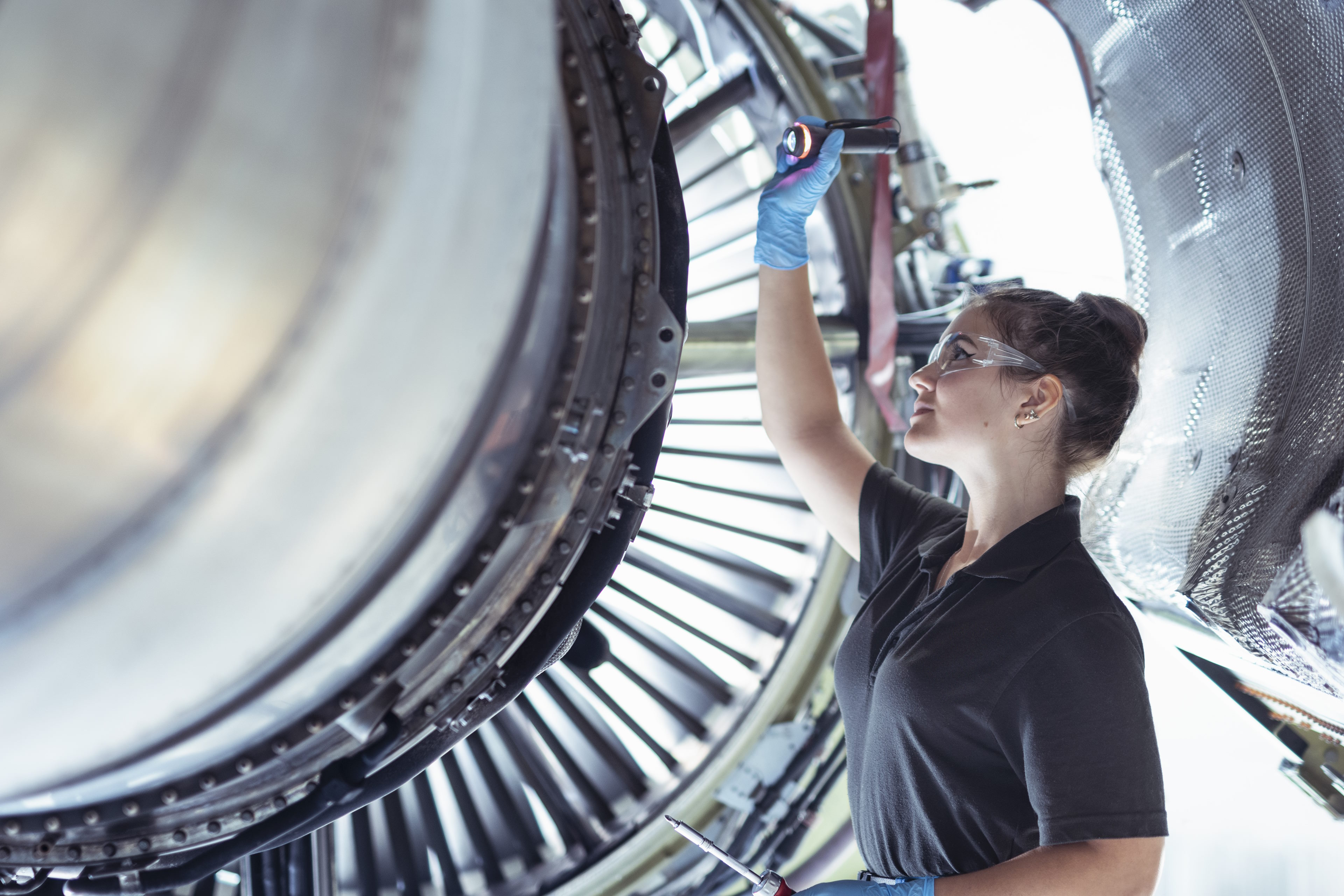 Woman operating machinery