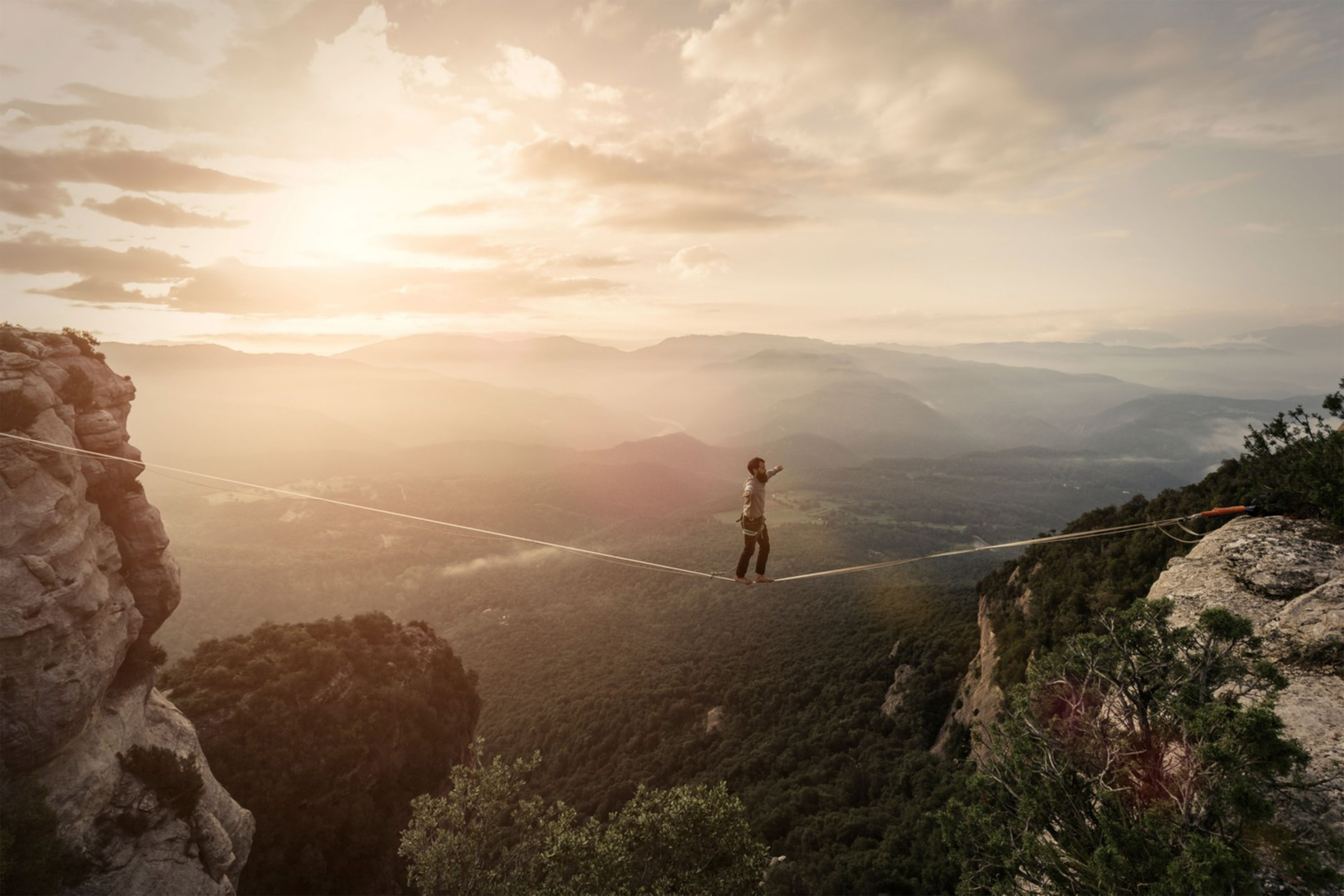 Person walking on a tightrope