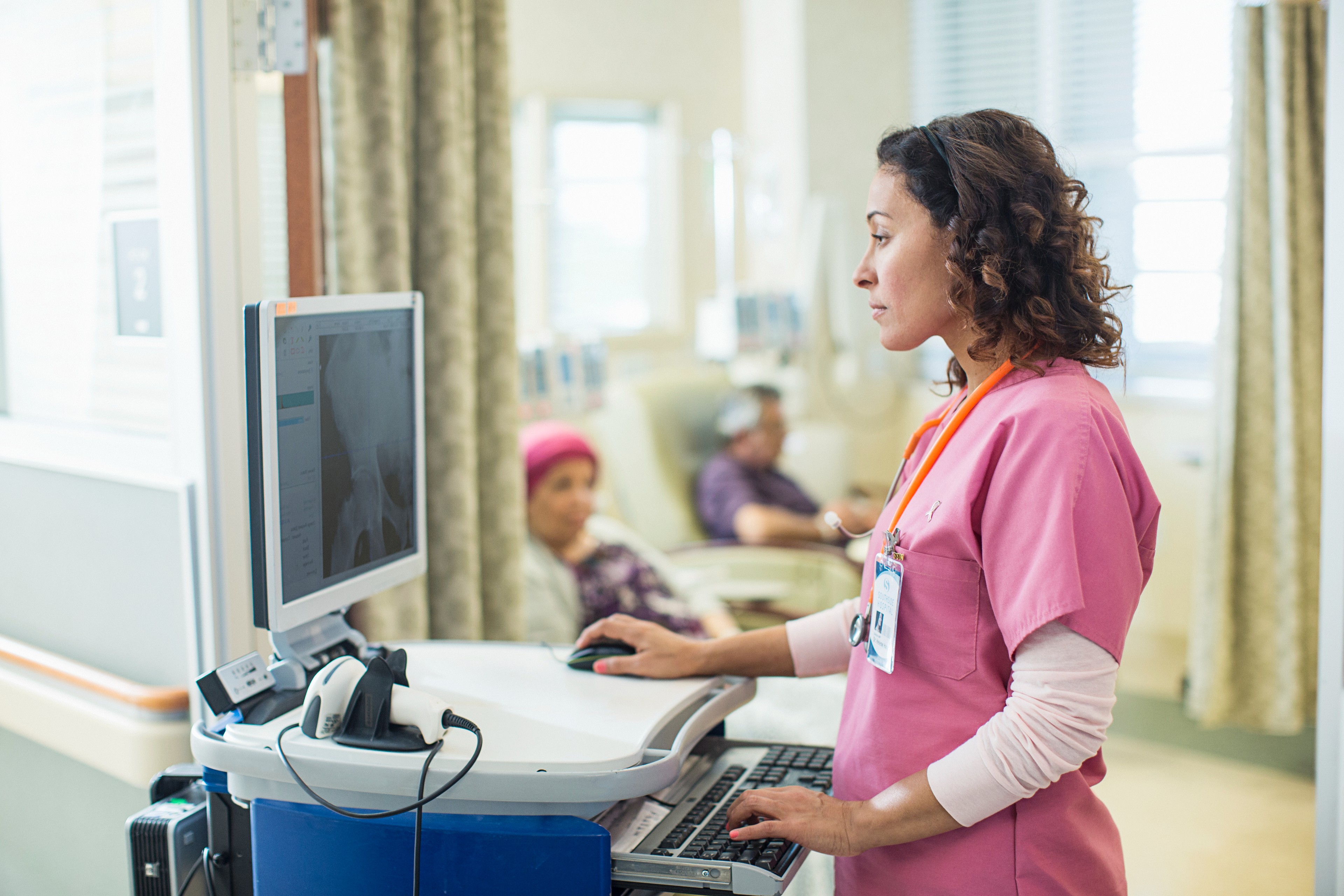 female doctor checking computer