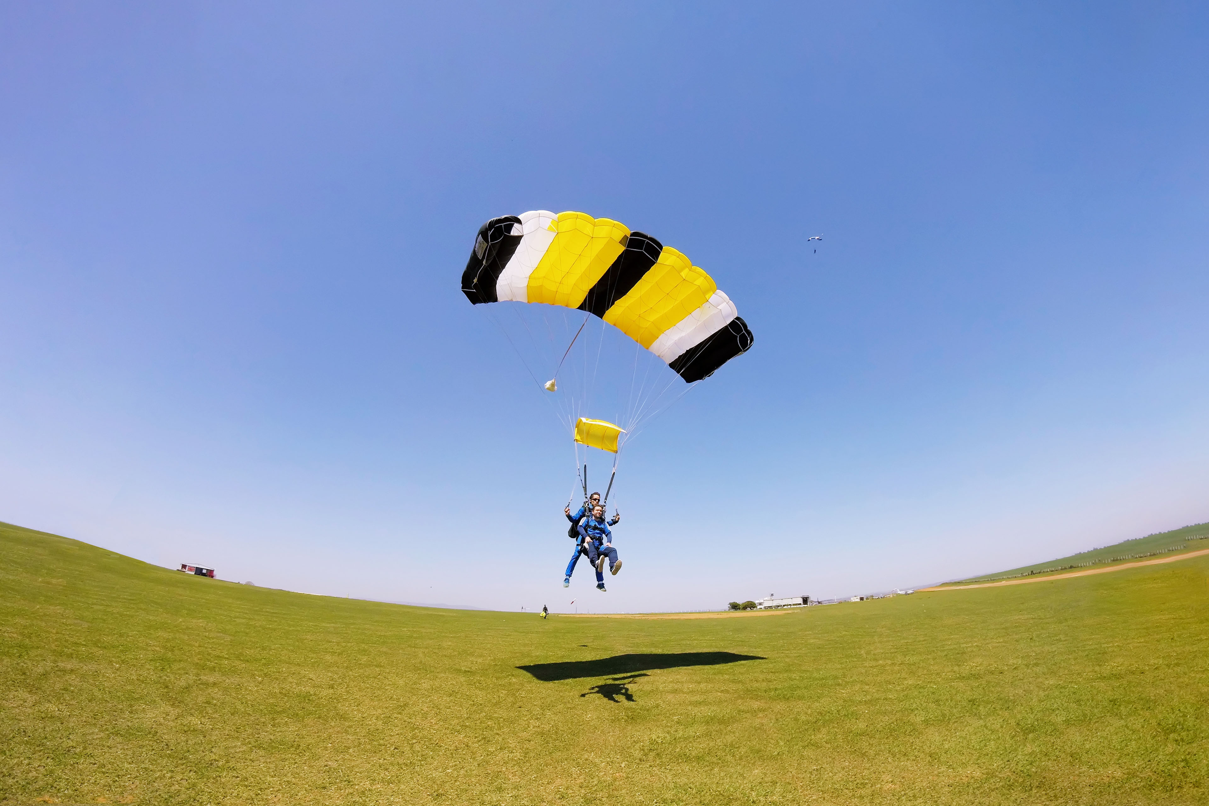 Two people paragliding