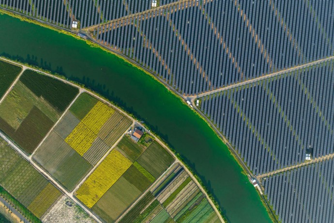 Aerial view of a landscape divided by a river