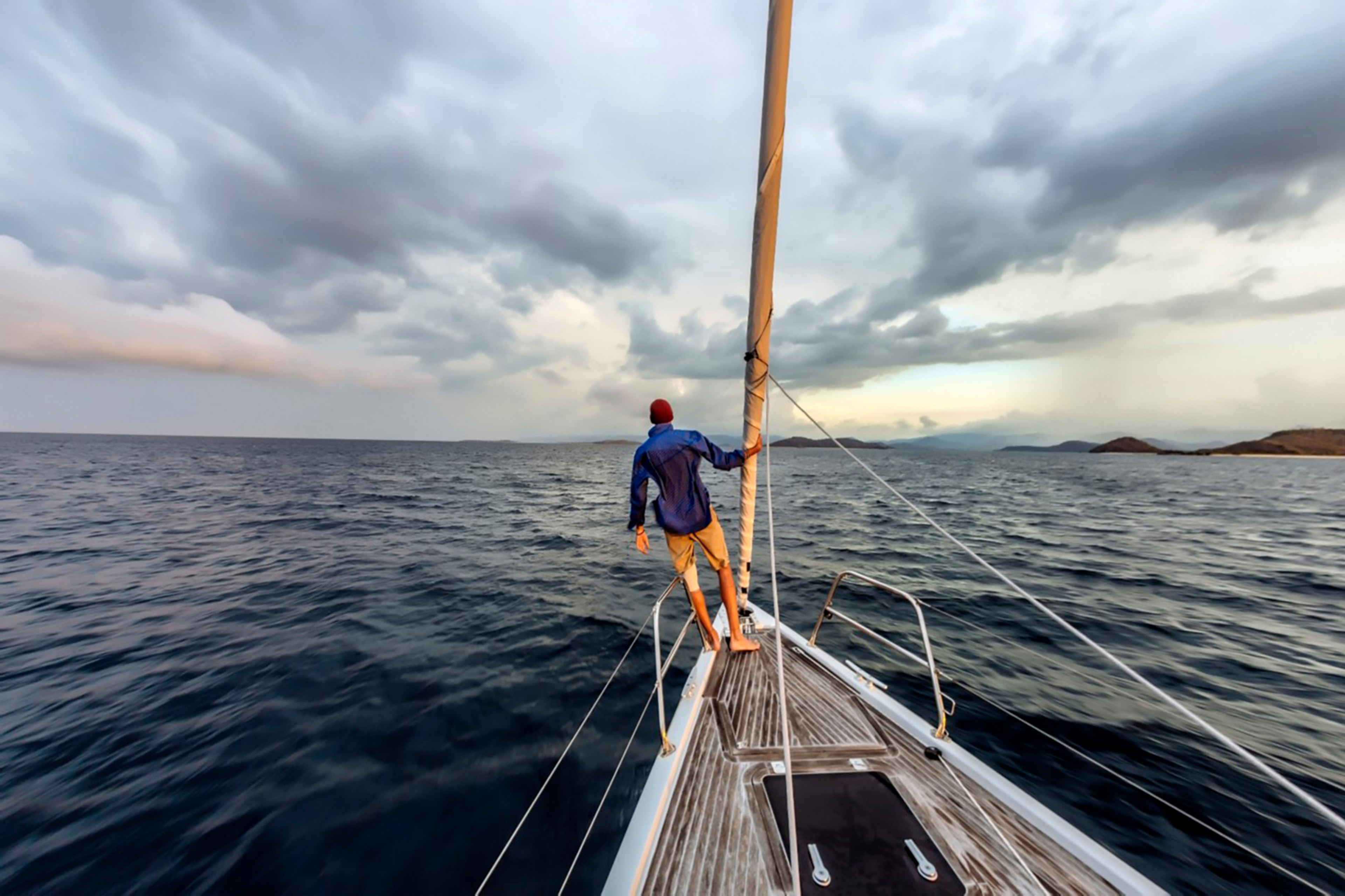 Man standing on shipyard in the ocean