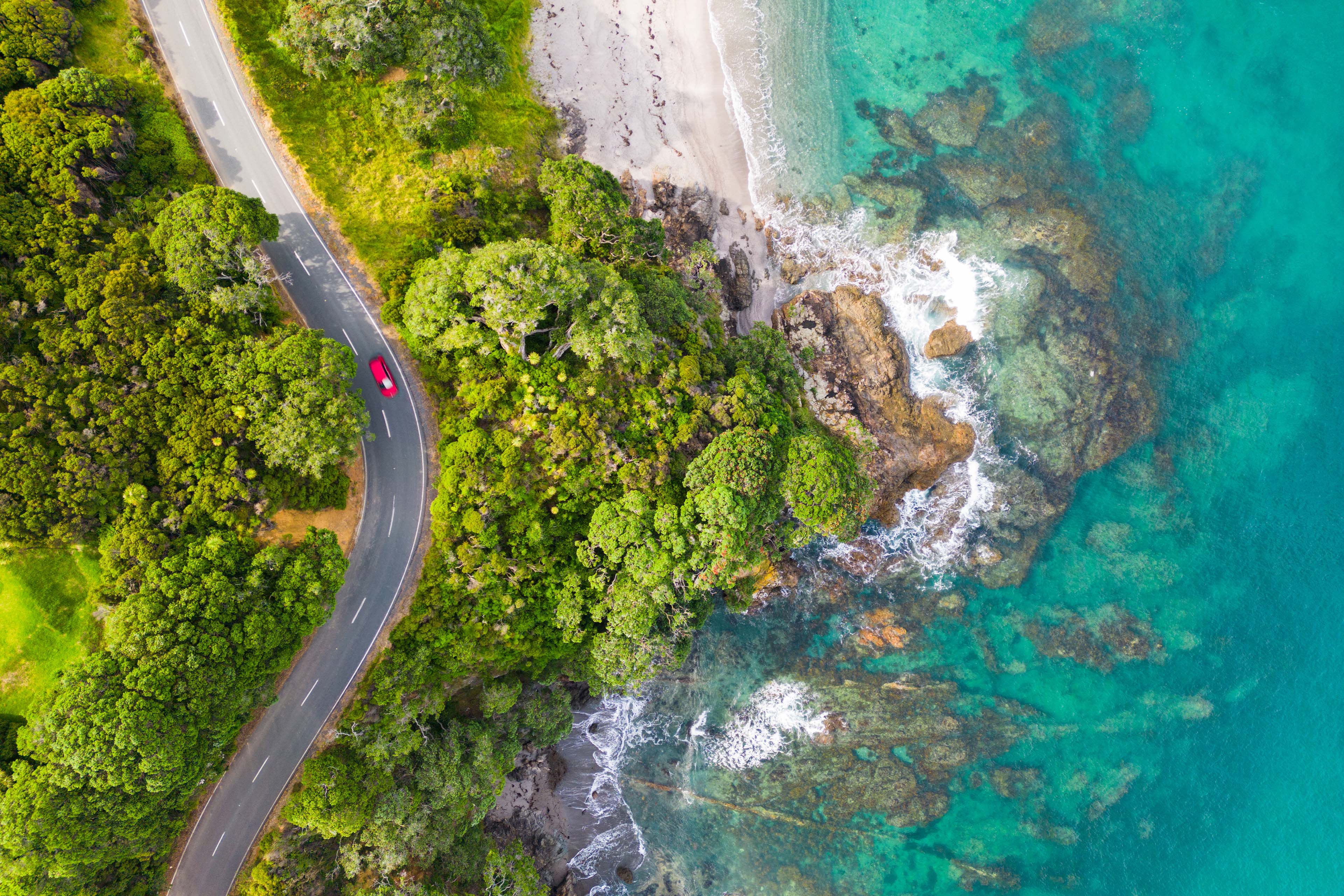 ey-arial-view-of-seaside-road-approaching-a-beach