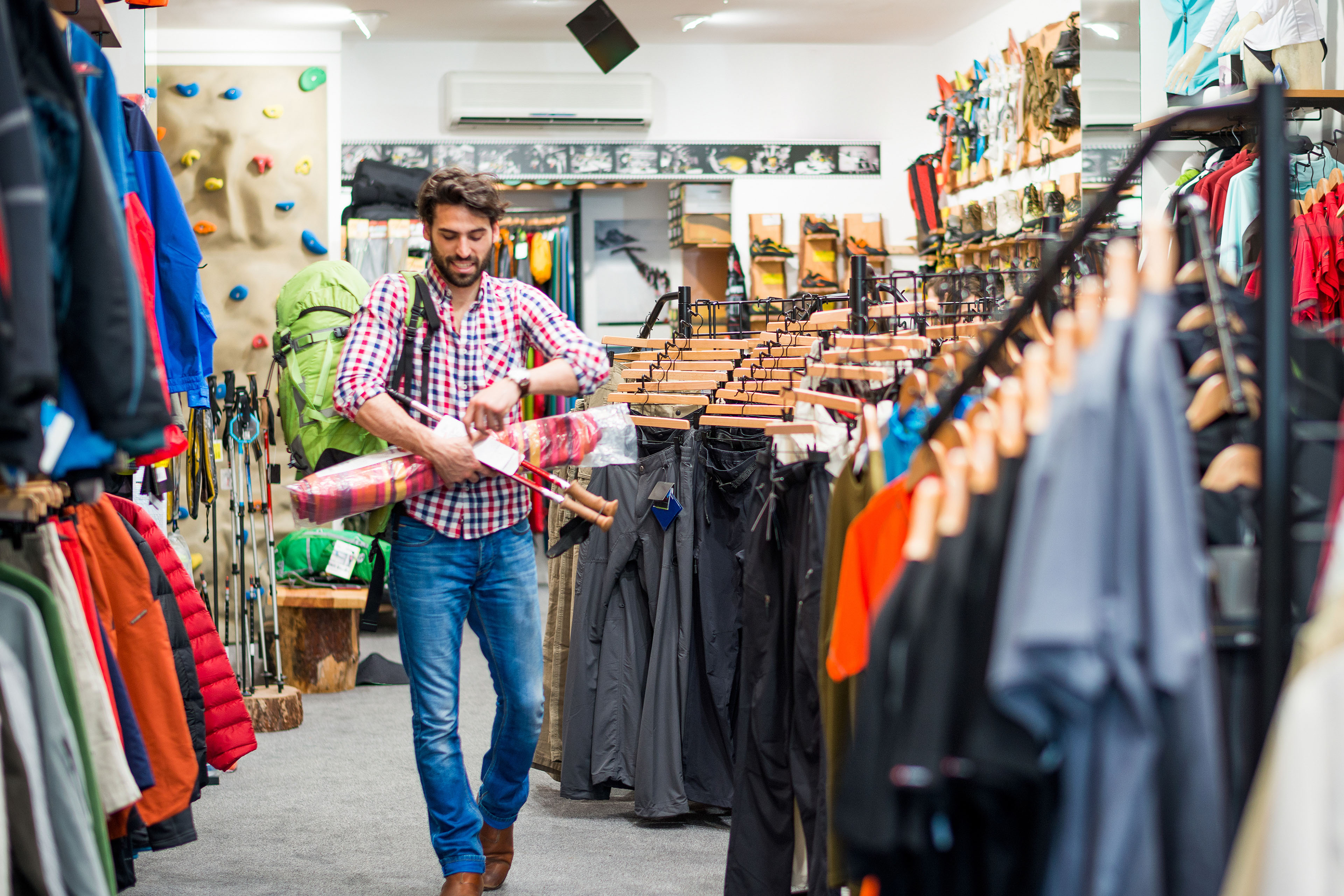 Male customer in outdoor equipment store